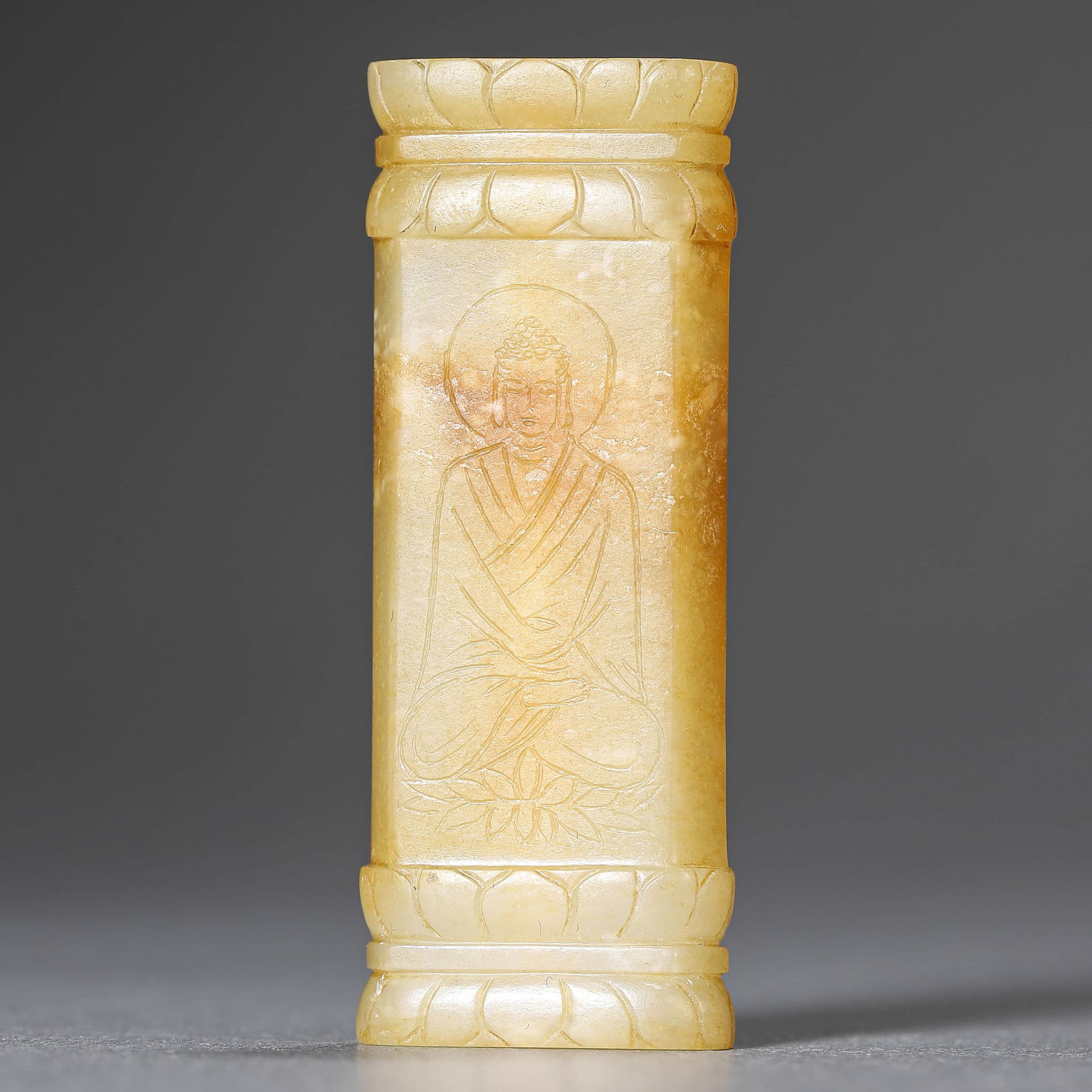 A CHINESE JADE BEAD WITH BUDDHA IMAGE CARVED IN INCISIVE LINES. (1 of 4)