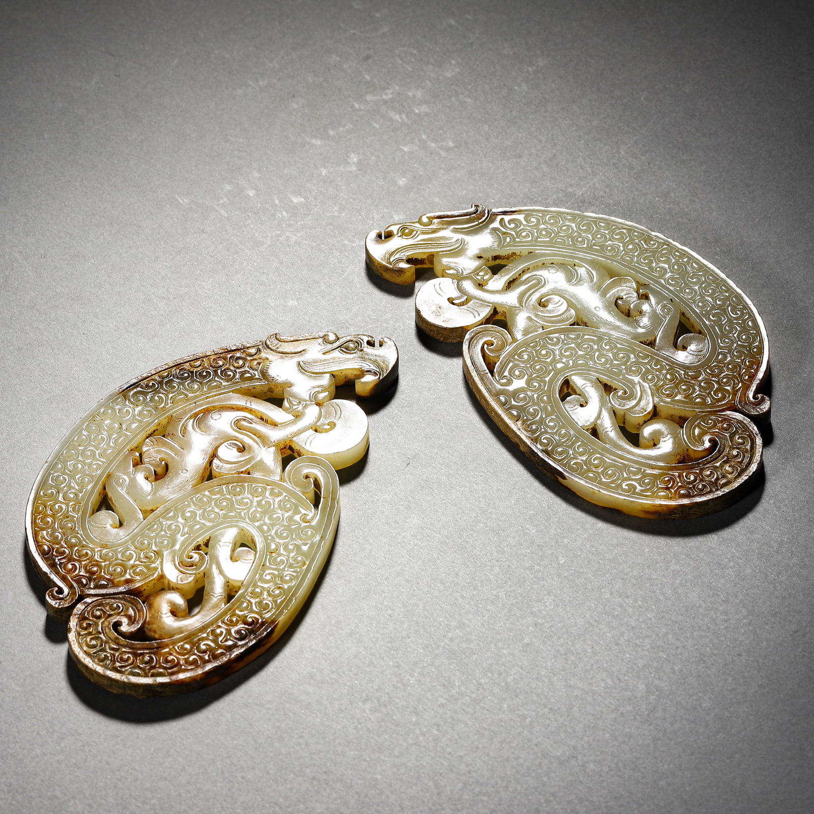 A SET OF CHINESE JADE DRAGON ORNAMENTS. (1 of 2)