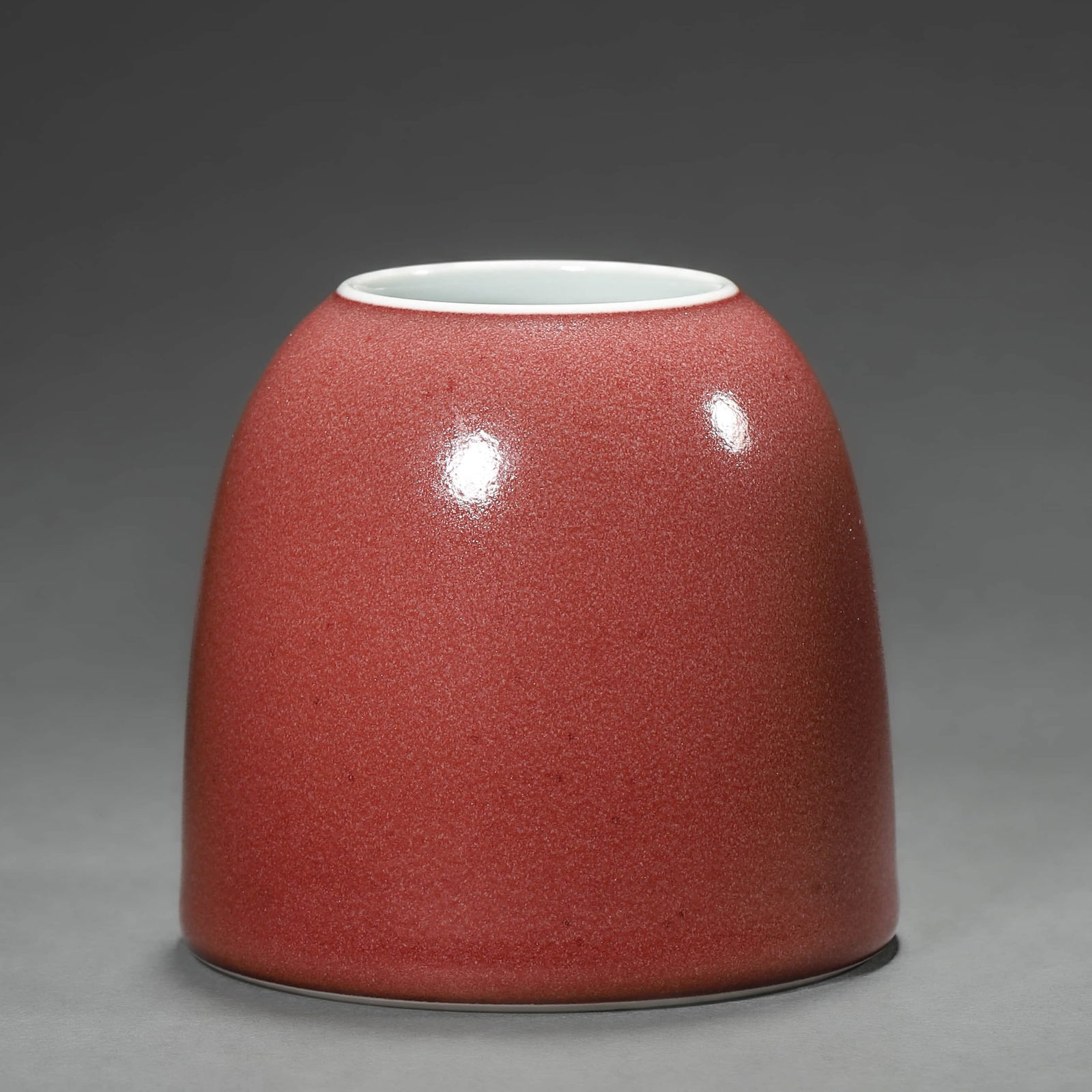 A CHINESE RED-GLAZED MA TI ZUN, MARKED "DA QING YONGZHENG NIAN ZHI," POSSIBLY QING DYNASTY, 18TH (1 of 2)