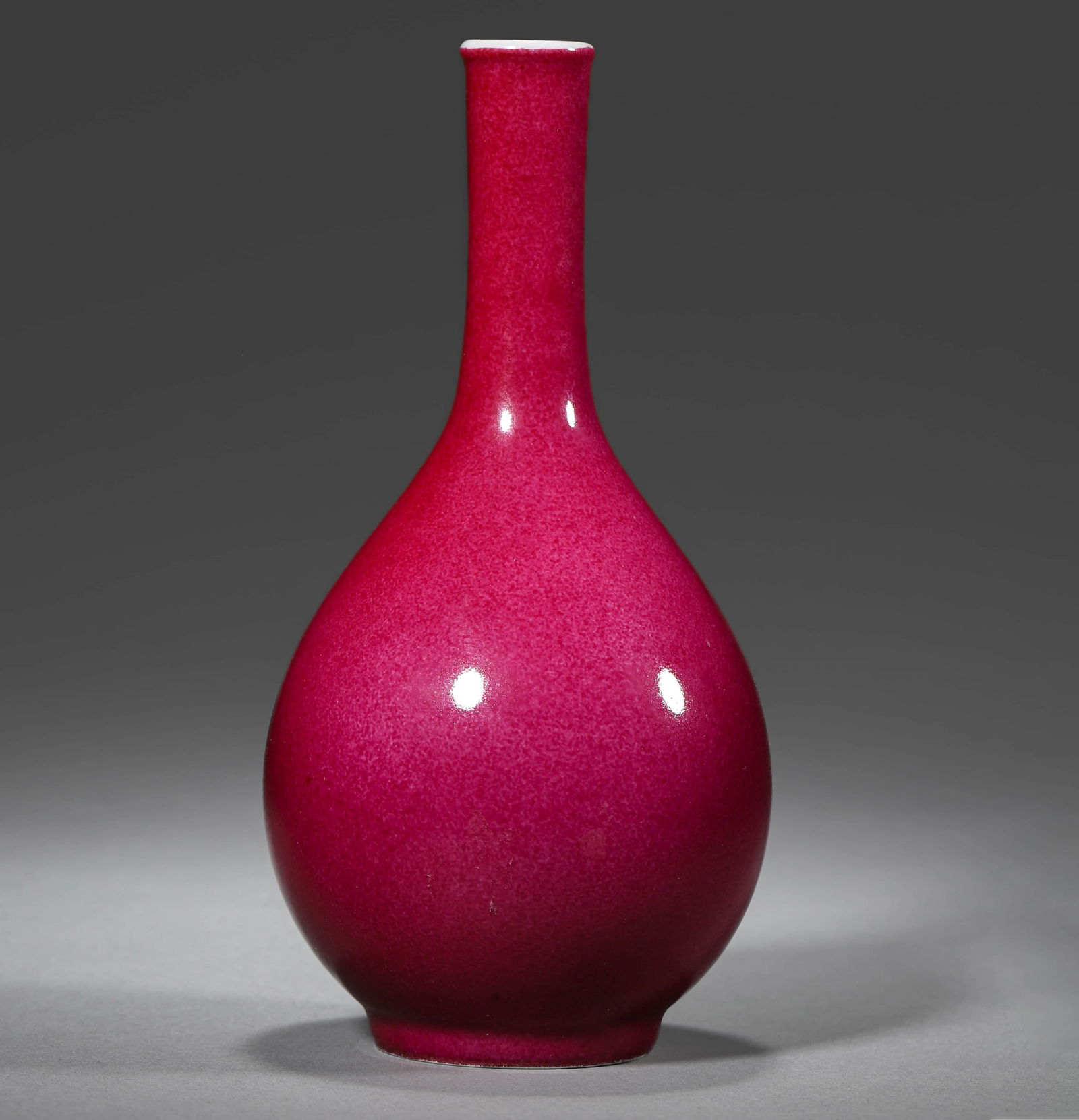 A CHINESE ROSE-GLAZED VASE, MARKED "DA QING YONGZHENG NIAN ZHI," POSSIBLY QING DYNASTY, 18TH (1 of 2)