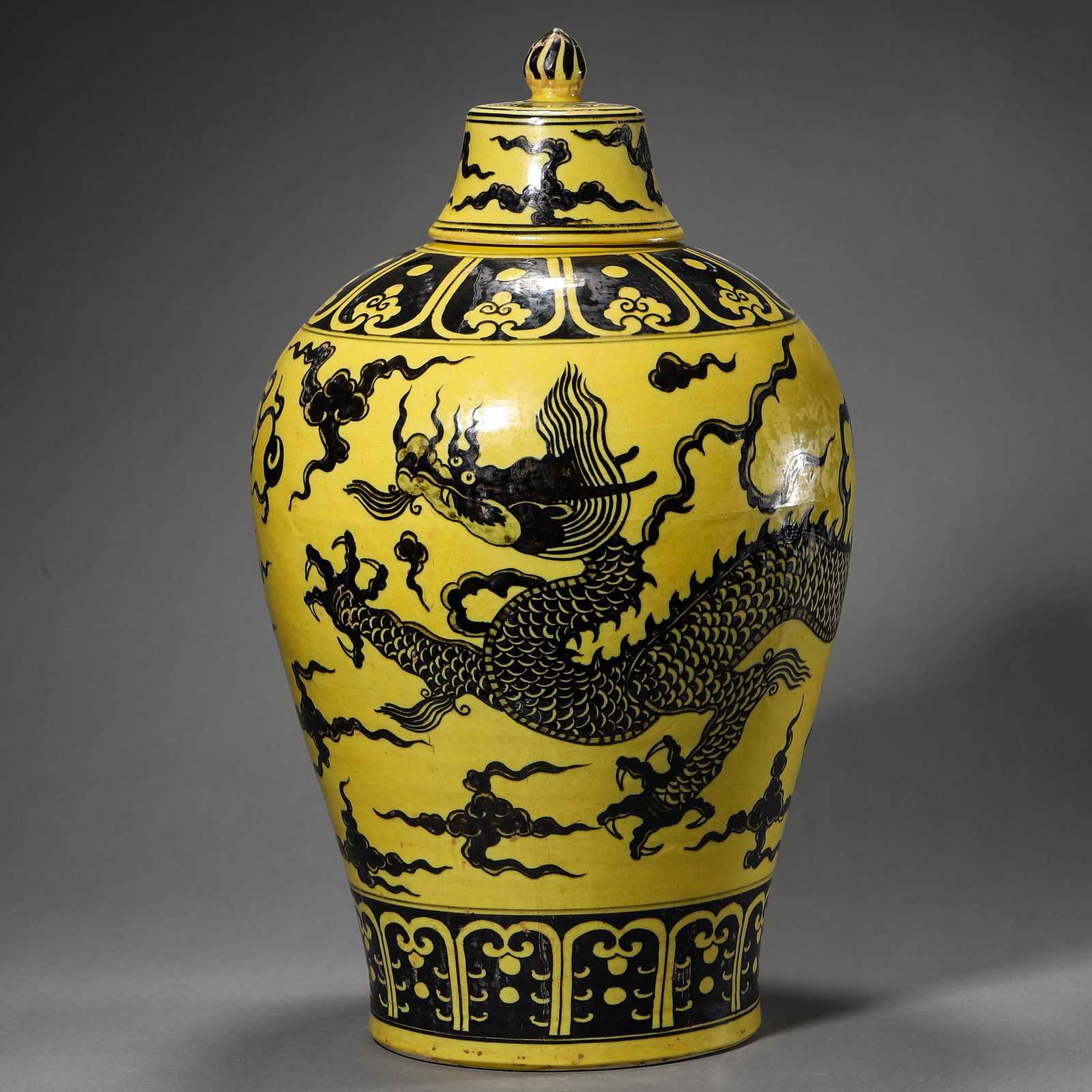 A CHINESE YELLOW-GROUND MEIPING VASE WITH BLACK ENAMEL CLOUD AND DRAGON MOTIF, MARKED "DA MING (1 of 4)