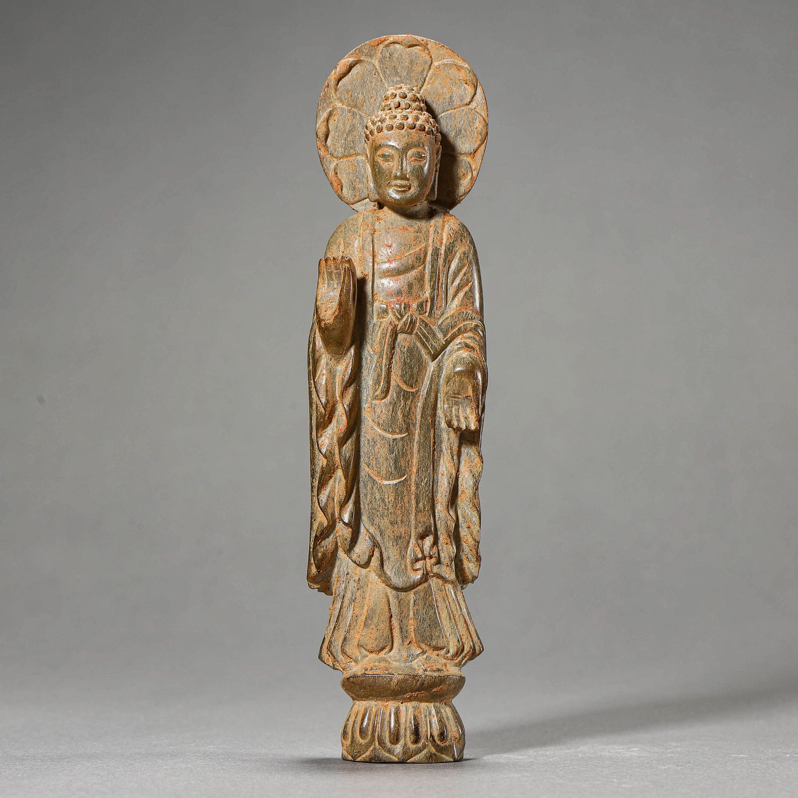 A CHINESE JADE CARVING OF A BUDDHA FIGURE, POSSIBLY MING DYNASTY, 16TH CENTURY. (1 of 4)