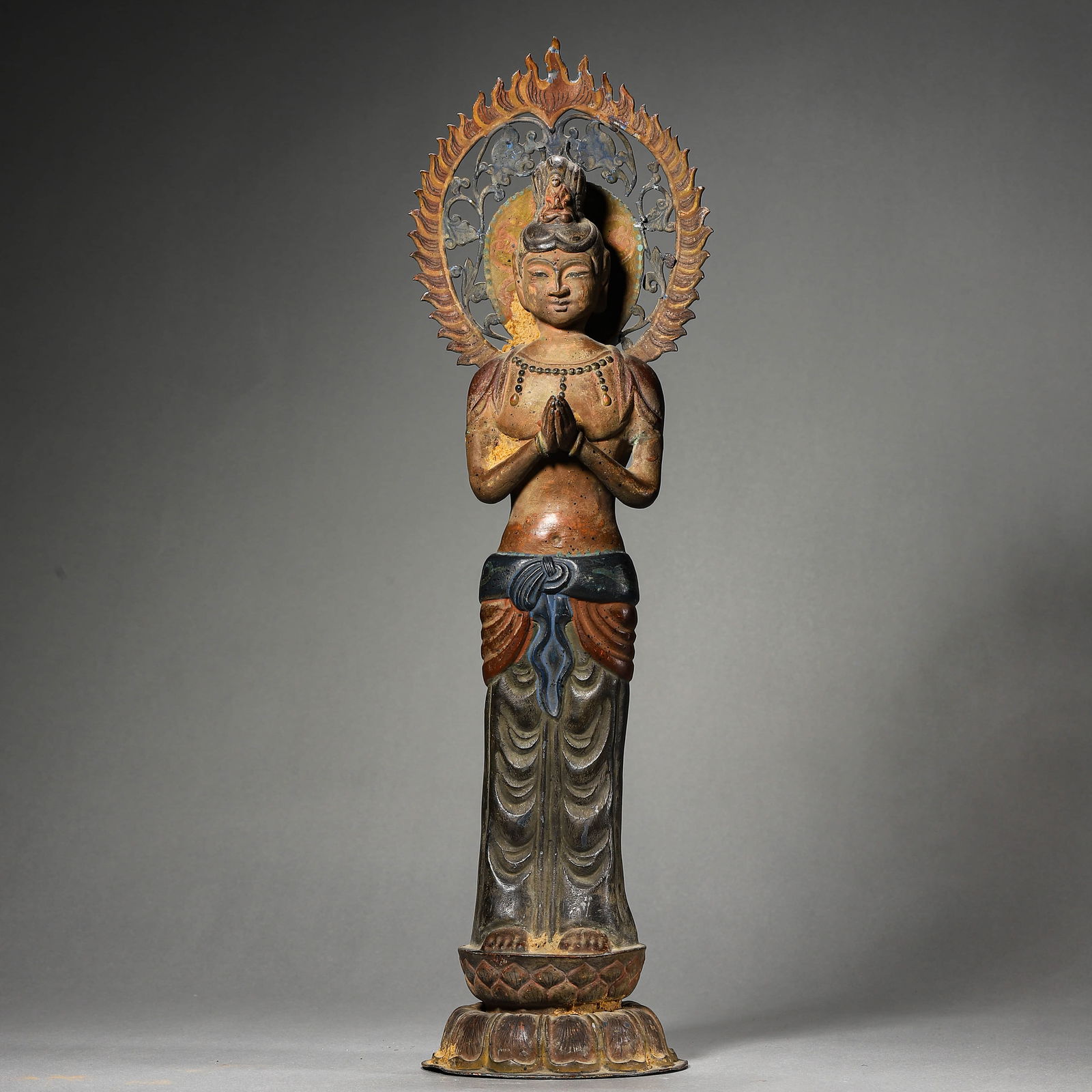 A CHINESE SILVER BUDDHA FIGURE. (1 of 3)