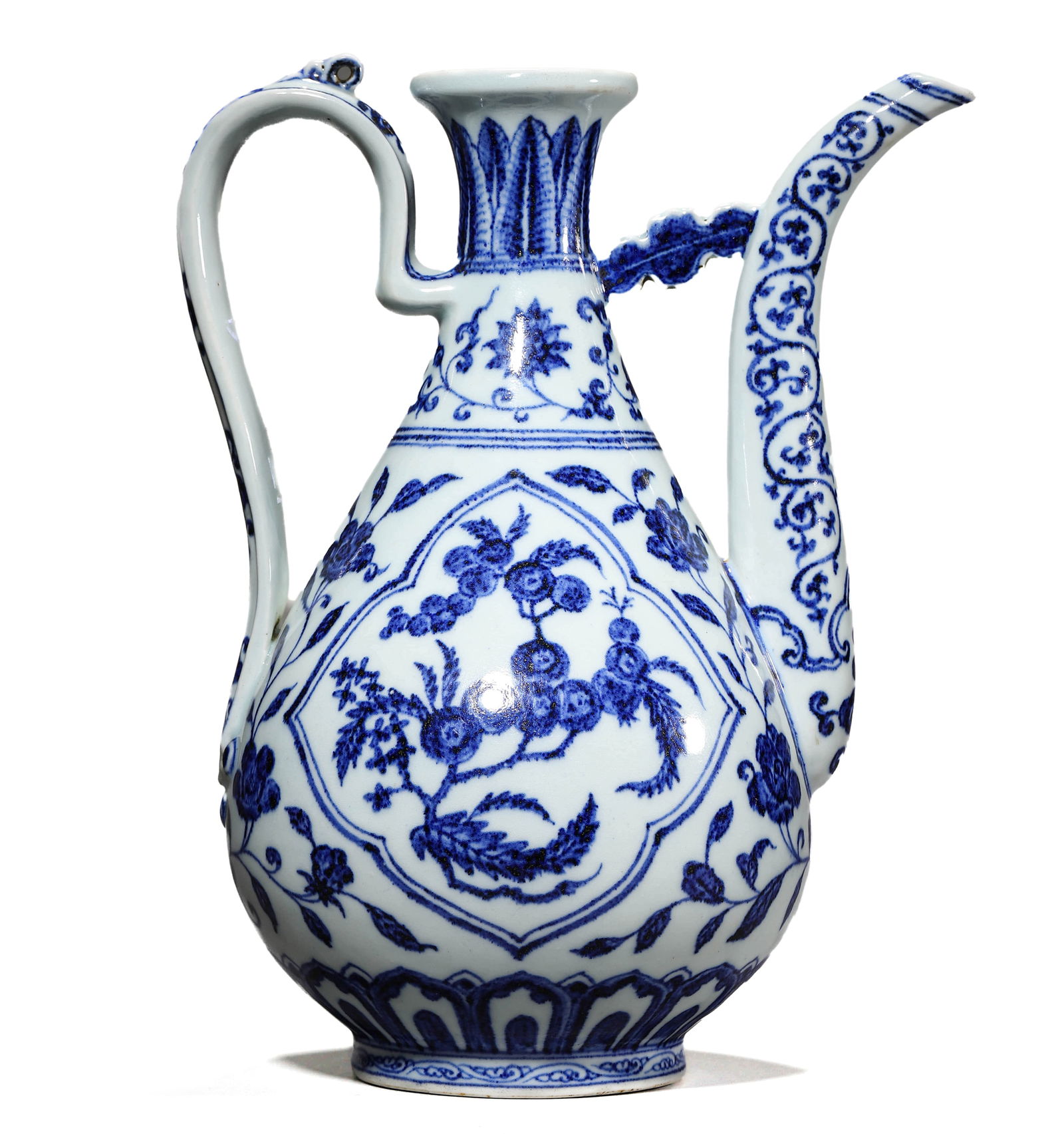 A CHINESE BLUE AND WHITE 'FLOWER PATTERN' HANDLE PITCHER. (1 of 5)