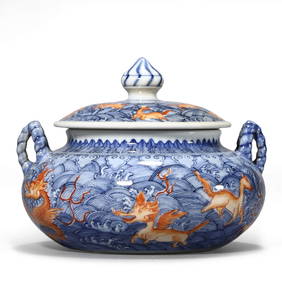 A CHINESE BLUE AND WHITE UNDERGLAZE RED "EIGHT IMMORTALS" DOUBLE-EARED COVERED JAR, MARKED "DA QING (1 of 3)