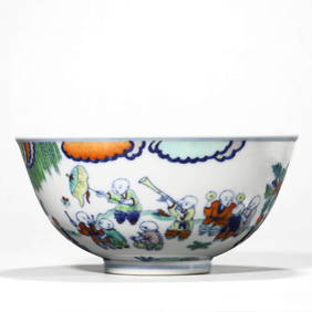 A CHINESE DOUCAI BOWL WITH CHILDREN AT PLAY PATTERN, MARKED "DA QING QIAN LONG NIAN ZHI," POSSIBLY (1 of 3)