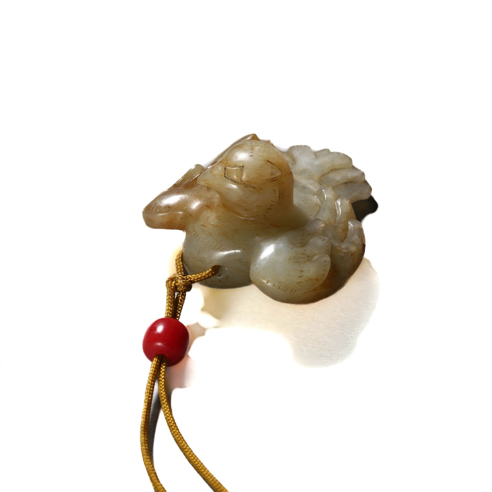 A CHINESE JADE OWL.: A CHINESE JADE OWL. Dimensions: Length: 1 3/4 in. (4.4 cm), Width: 1 5/8 in. (4.1 cm)