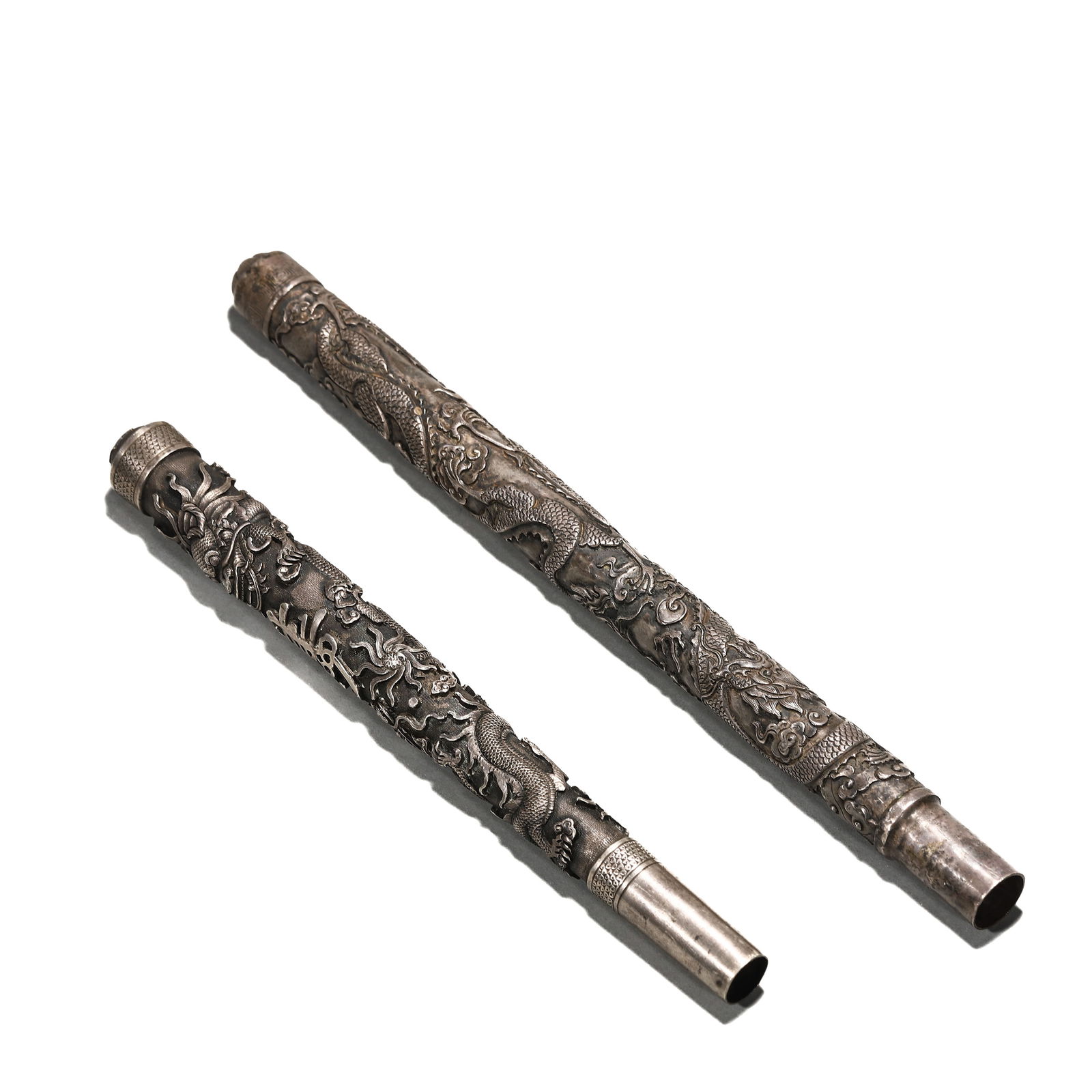 A GROUP OF CHINESE COPPER BRUSH HANDLES WITH DRAGON PATTERN. (1 of 5)