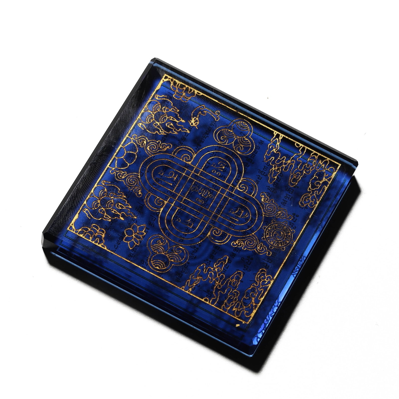 A CHINESE LAPIS LAZULI ENAMELED WITH GOLD TIBETAN INSCRIPTION RECTANGULAR PLAQUE.: A CHINESE LAPIS LAZULI ENAMELED WITH GOLD TIBETAN INSCRIPTION RECTANGULAR PLAQUE. Dimensions:Length: 2 3/8 in. (6.1 cm), Width: 2 3/8 in. (6 cm), Thickness: 5/16 in. (0.8 cm), Weight: 73 g ALL ITEMS S