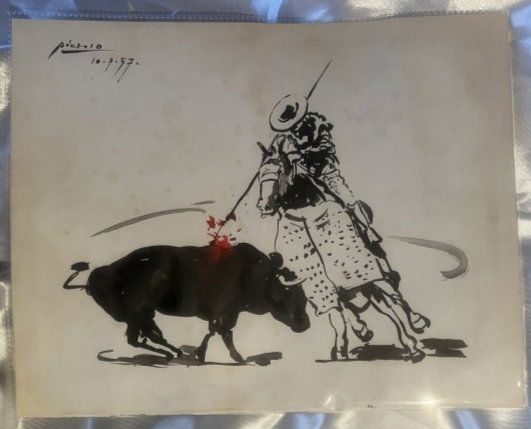 Picasso original painting of a Bull fight 1957............No reserve: Lot number 18 is an original painting by Pablo Picasso of a Bull fighting Red and Black paint and signed to the upper left hand corner and dated10.7.57. It is 27cm by 21.4cm in size and holds the muse