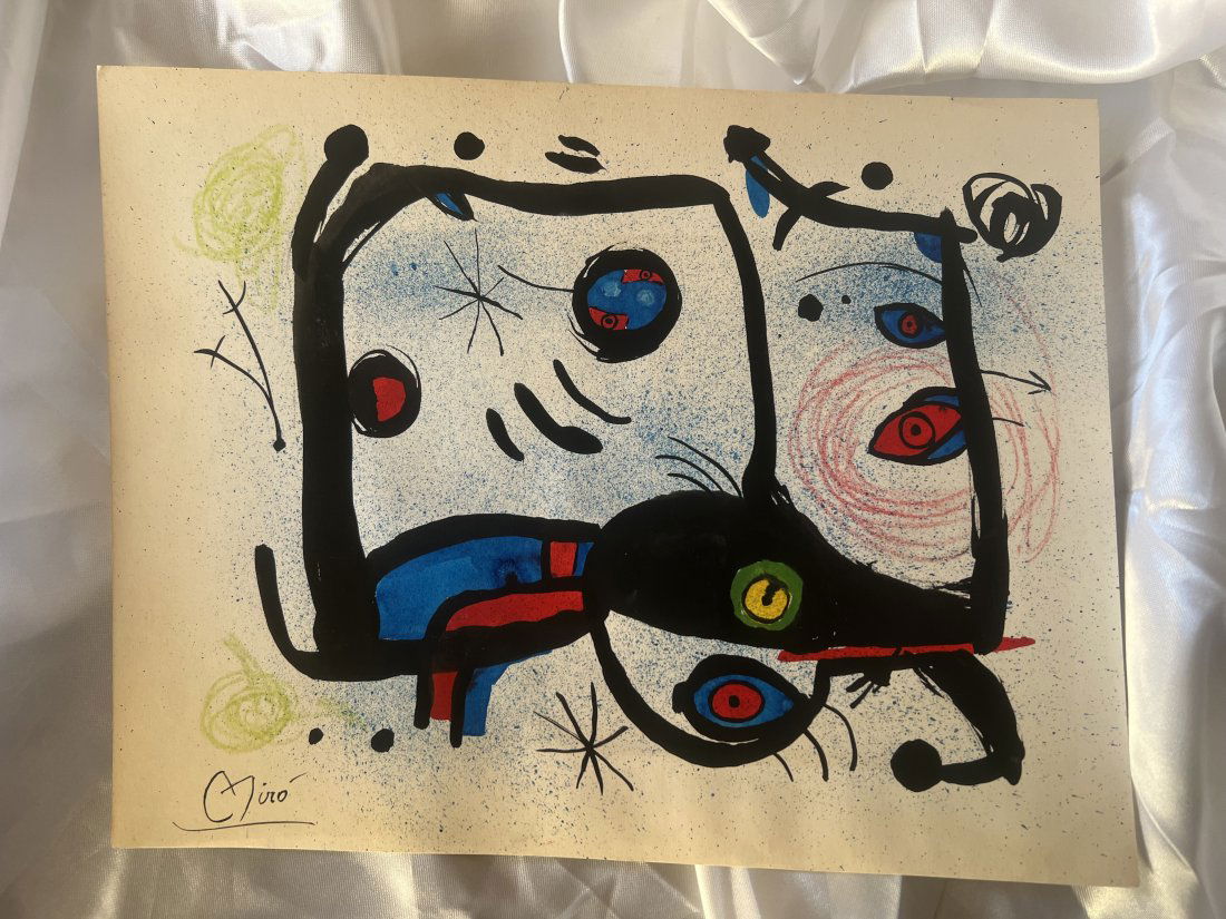 Joan Miro original painting with Barcelona stamp....No Reserve: Lot number 28 is an original Watercolour painting by Joan Miro on cream paper. It is 12 inches by 9/ 1/2 inches in size. Signed to the lower left hand corner. It contains a label; on the rear with two