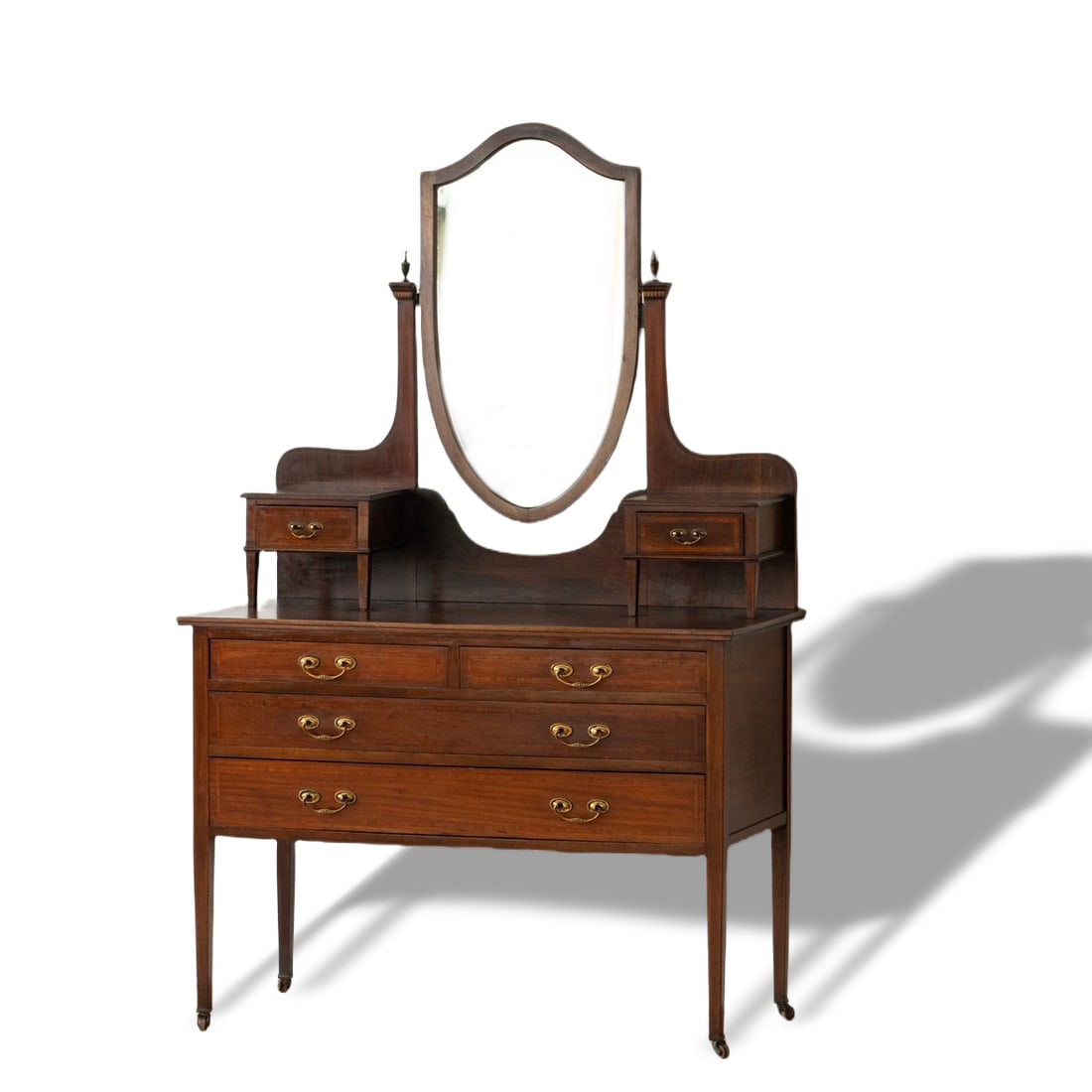 1930S BRITISH ANTIQUE TABLE: 167 cm x 107 cm x 48 cm (65 3/4 in x 42 1/8 in x 18 7/8 in) This is an antique dressing table from 1930s England. It features an oval mirror with small drawers on each side for storing small items. Th