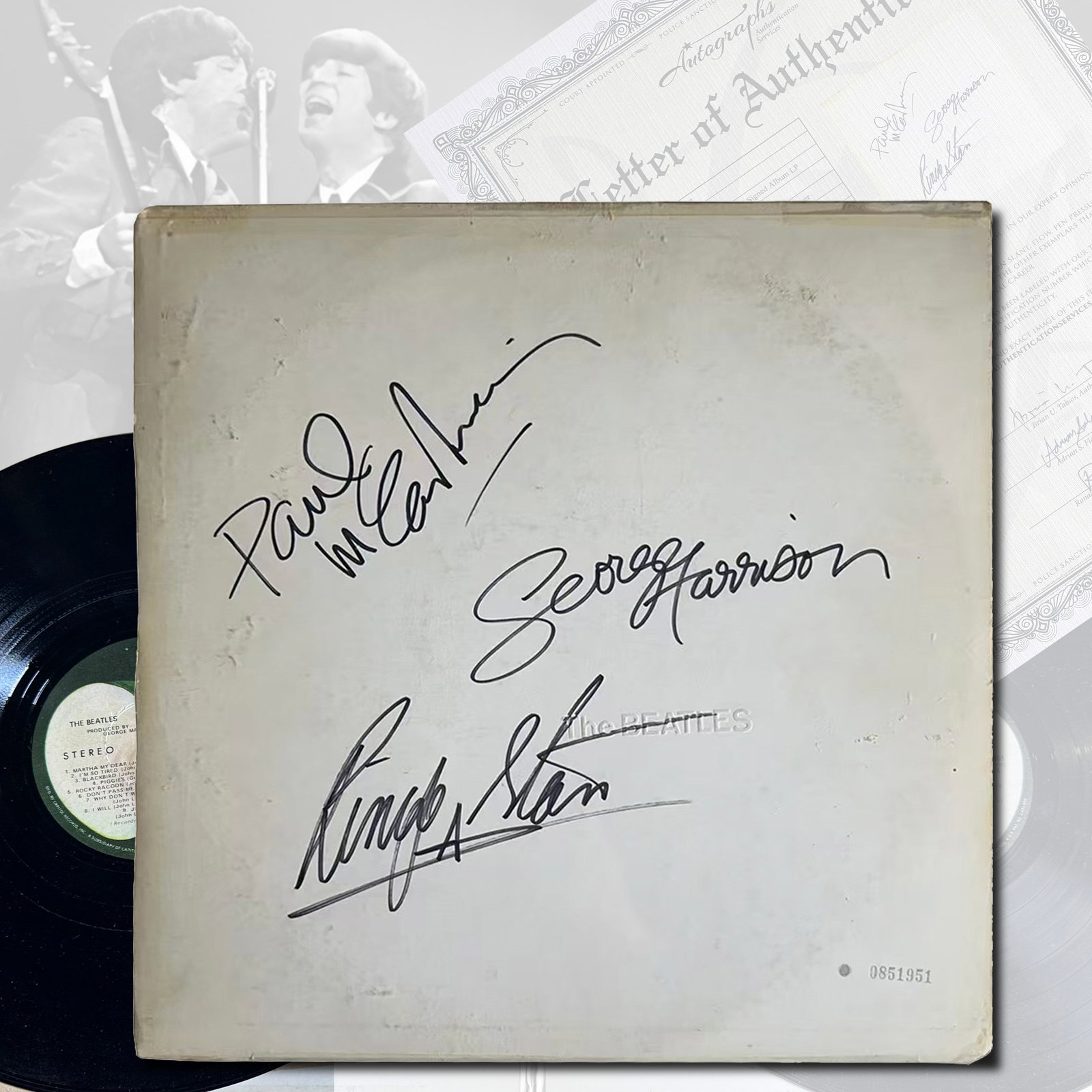 THE BEATLES SIGNED "WHITE ALBUM" ALBUM LP: 12 1/4 x 12 1/4 inches This "White Album" LP cover, signed by three Beatles members—Paul McCartney, George Harrison, and Ringo Starr—includes a Certificate of Authenticity from a trusted certifica