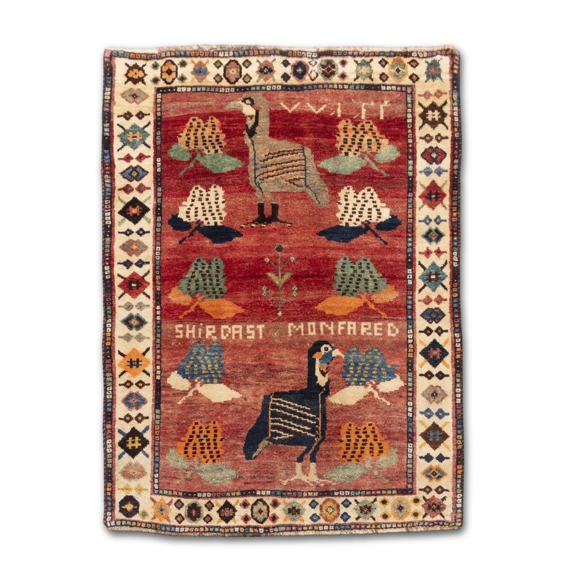 1930S SHIRAZ GABBEH WOOL HAND-WOVEN CARPET WITH PLANT DYES: Dimensions: 1.4x1.03m (4 1/2 x 3 1/8 feet). Woven by Shirdast Monfared, whose name is left on the carpet in English, a common feature in Persian carpets exported to Europe and the U.S. in the 1920-30s