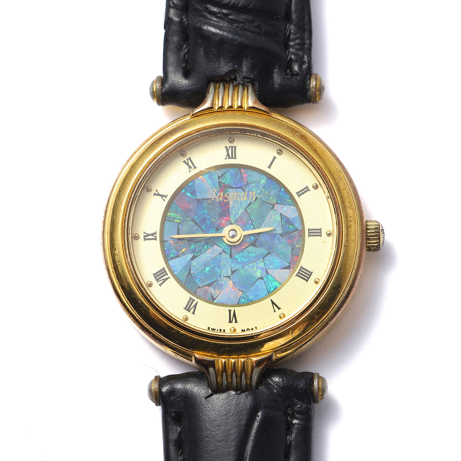 A JASMAN GOLD-PLATED LADIES' WRISTWATCH WITH OPAL MOSAIC DIAL.: length: 21 in (53.3 cm); dial diameter: 1 1/16 in (2.6 cm) This elegant timepiece features a vibrant opal mosaic dial with a captivating array of iridescent hues, framed by a gold-plated case and clas