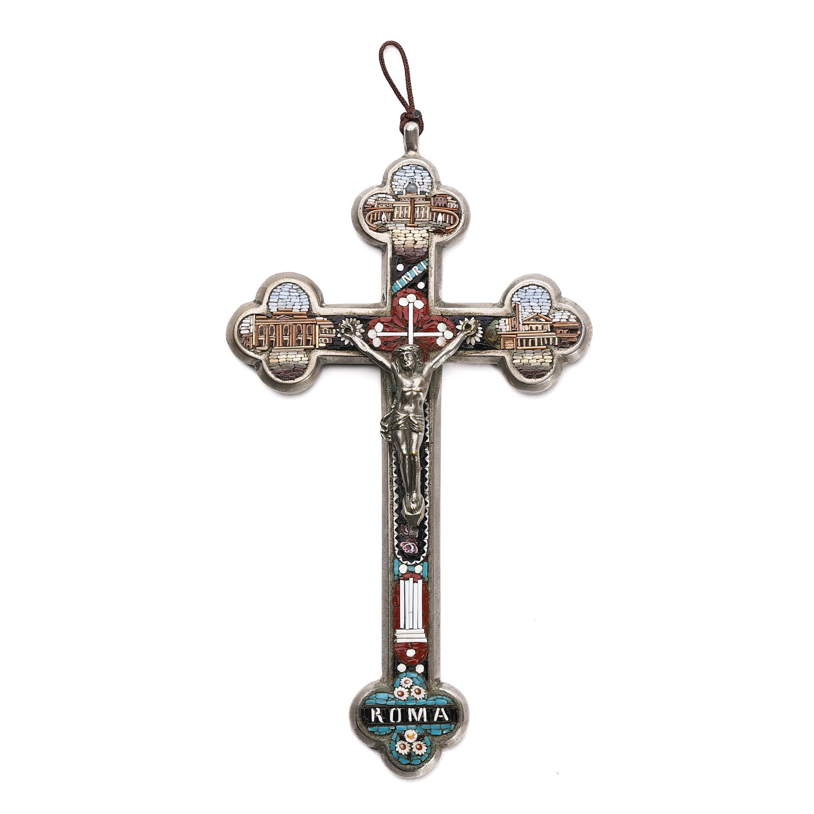 A MICRO-MOSAIC SILVER CRUCIFIX DEPICTING ROMAN LANDMARKS.: Dimensions: Height: 5 1/8 in. (13 cm), Width: 2 7/8 in. (7.3 cm), Weight: 62.5 g Description: This Italian micro-mosaic crucifix is intricately inlaid with tiny glass tesserae, depicting prominent Rom