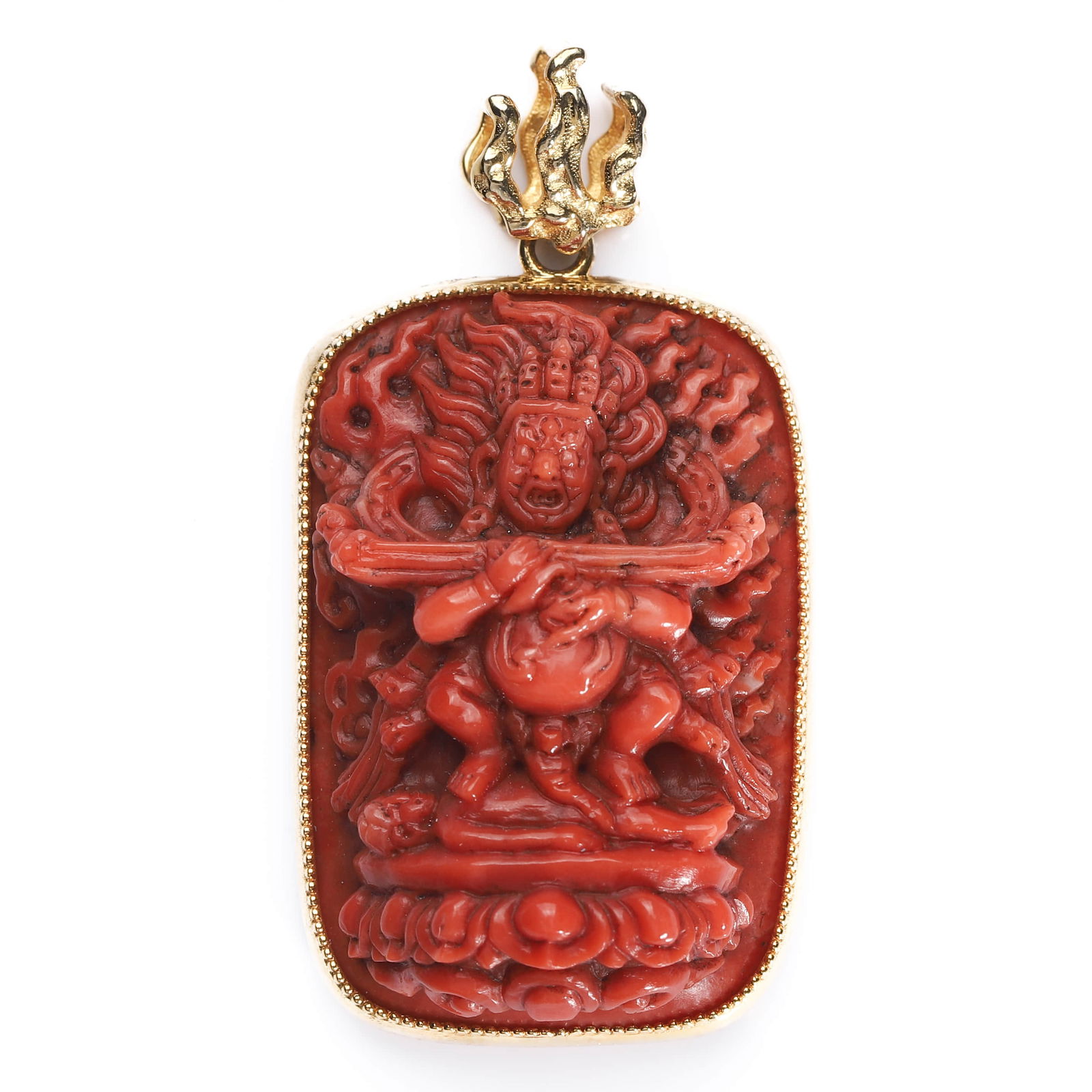A CARVED CORAL VAJRAPANI PENDANT WITH GOLD MOUNT: Dimensions Length: 1 5/8 in. (41 mm); Width: 7/8 in. (22 mm); Weight: 12.8 g Description The pendant is finely carved from natural red coral in high relief, depicting Vajrapani, the Buddhist guardian