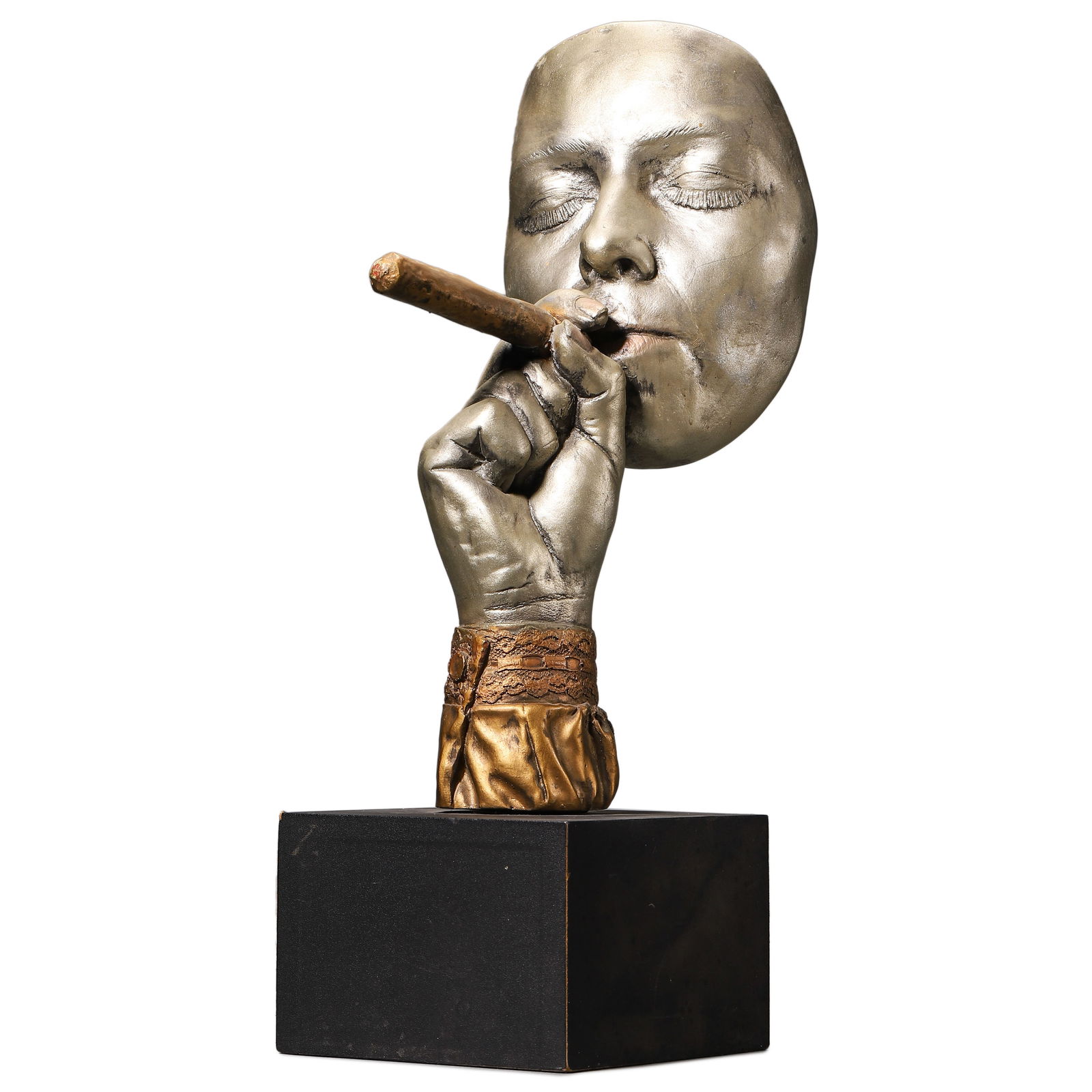 ANTHONY CUTRONE, CONTEMPORARY BRONZE SCULPTURE, “THE THINKER'S MASK: Height: 15 3/8 in. (39 cm) This striking bronze sculpture by Anthony Cutrone features a surrealist composition of a disembodied mask-like face supported by two finely sculpted hands. The expressive fa