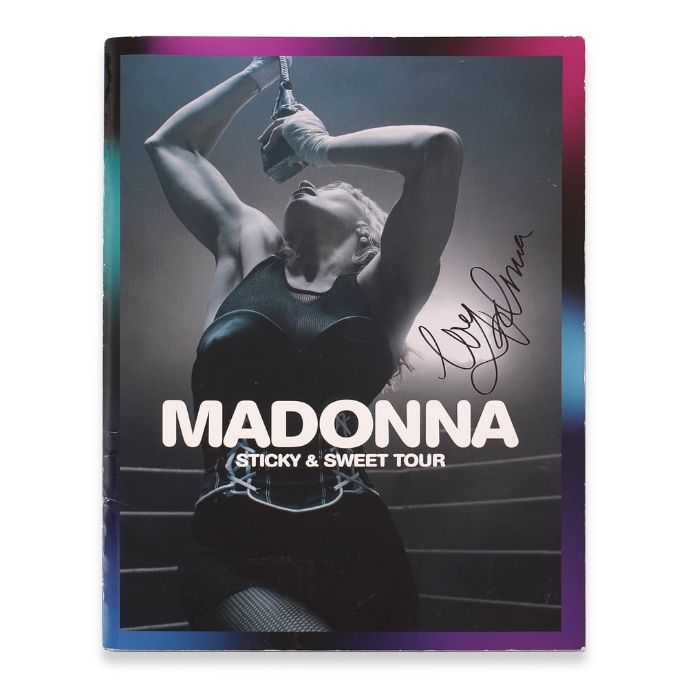 MADONNA SIGNED STICKY & SWEET TOUR PROGRAM: 13 1/4 x 9 3/8 in (33.6 x 23.8 cm) Provenance and Authentication: This collectible has undergone a rigorous forensic evaluation. The signatures were carefully analyzed across multiple criteria,