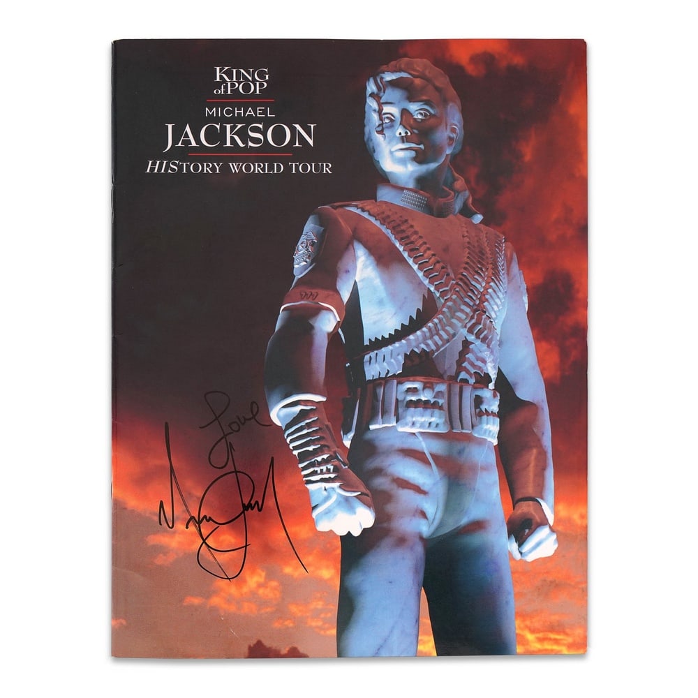 MICHAEL JACKSON SIGNED "HISTORY WORLD TOUR" PROGRAM: 15 3/8 x 12 in (39.1 x 30.5 cm) Provenance and Authentication: This collectible has undergone a rigorous forensic evaluation. The signatures were carefully analyzed across multiple criteria,