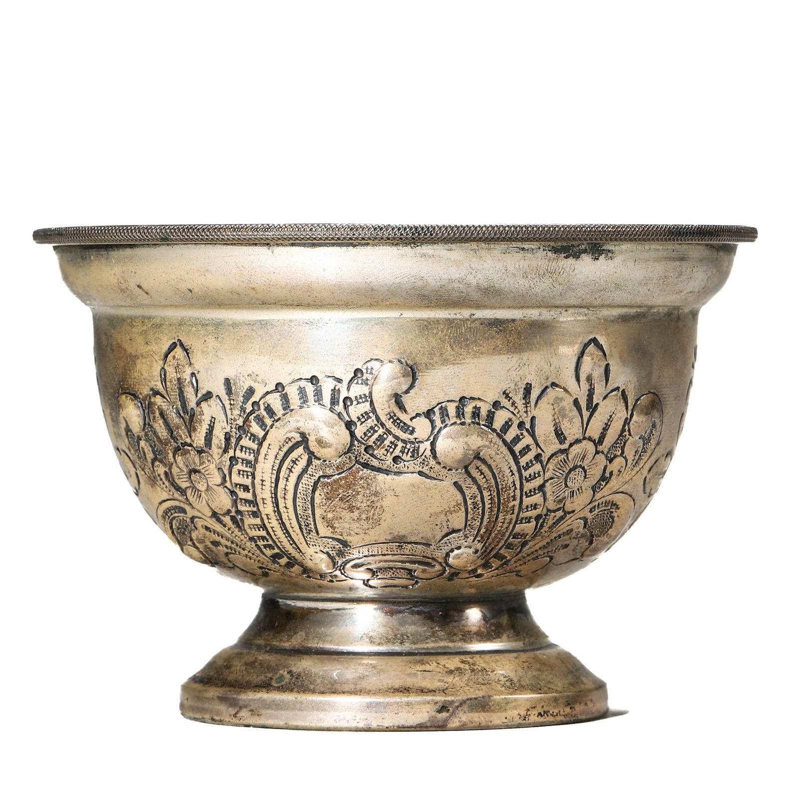 A SILVER REPOUSSÉ BOWL WITH GLASS LINER: Dimensions Height: 5 1/2 in (14 cm), Width: 3 1/2 in (9 cm), Weight: 10.1 oz (286.2 g) Description The silver bowl, raised on a circular foot, is decorated with repoussé floral and scroll motifs enci
