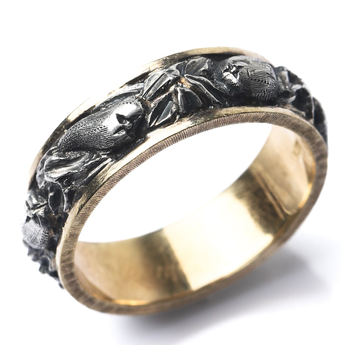 BUCCELLATI ANTIQUE GOLD AND SILVER CARVED BAND RING: Dimensions Inner diameter: 21/32 in (16.9 mm); Weight: 6.7 g Description This exceptional antique band ring is a work by Federico Buccellati, handcrafted in a distinctive combination of 18k yellow gol
