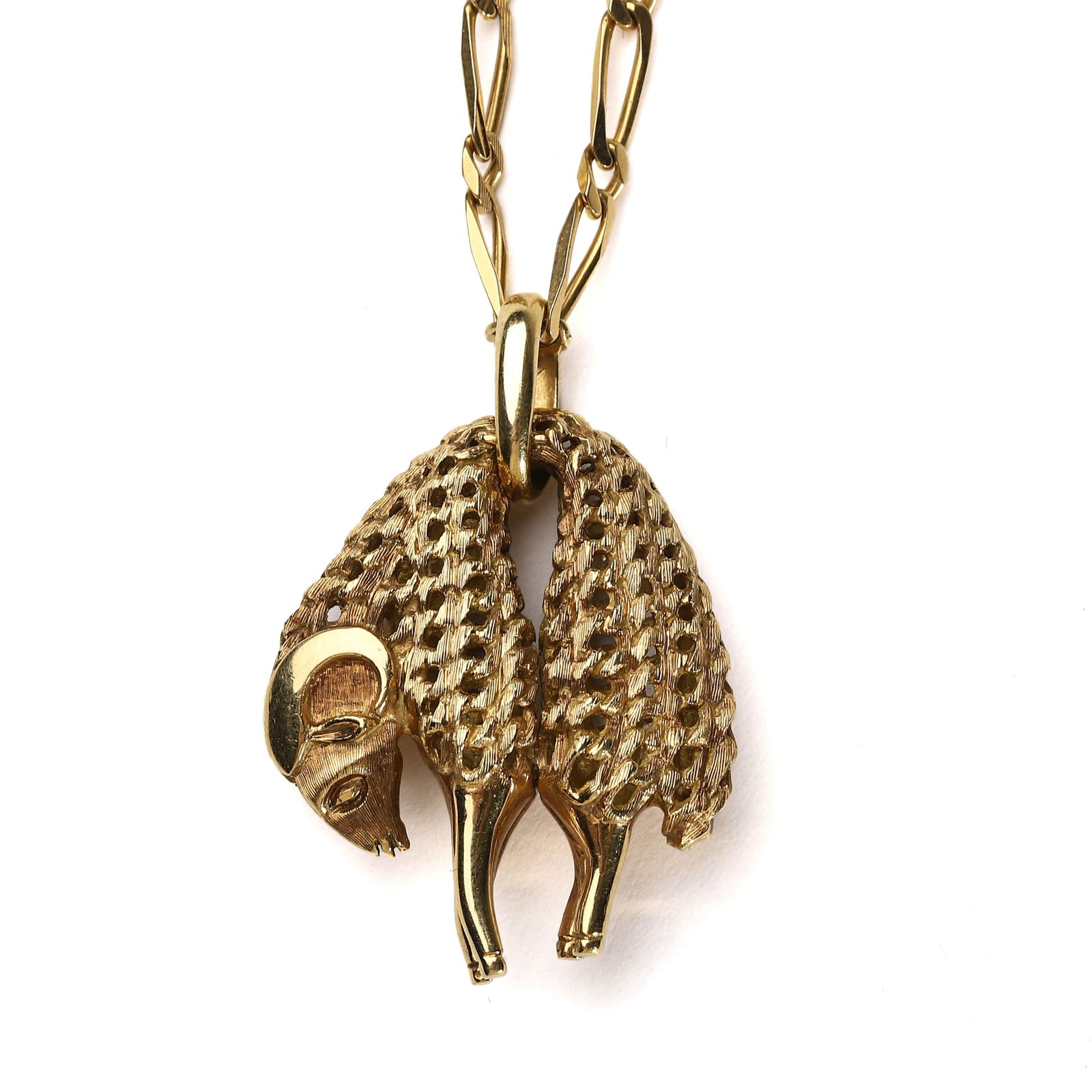 A GOLD 'GOLDEN FLEECE' PENDANT NECKLACE, SIGNED CARTIER: Dimensions: Length: 20 7/8 in. (53 cm) Weight: 30 g Description & Analysis: This elegant 18k yellow gold necklace features a pendant sculpted in the form of the Golden Fleece, an enduring symbol of