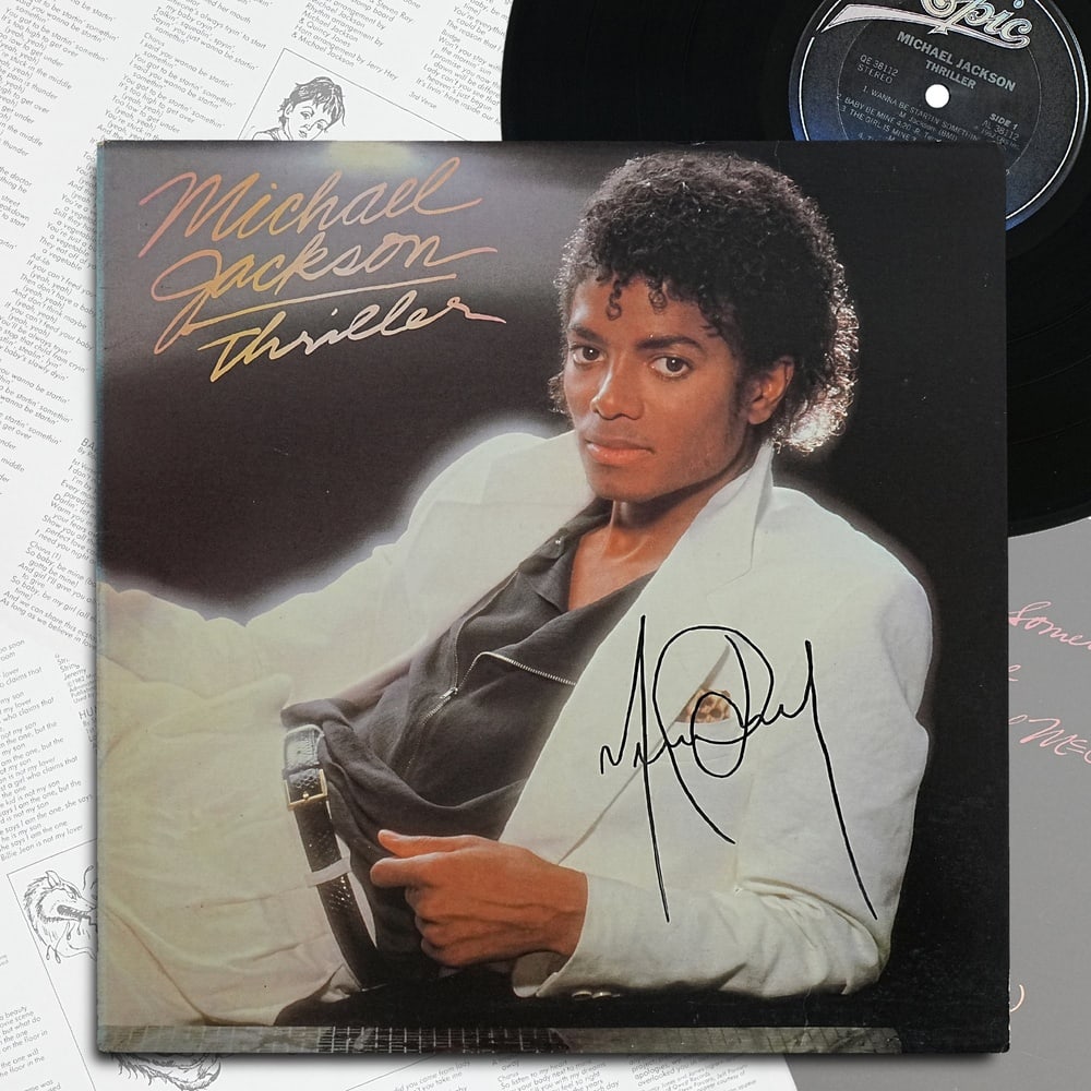 MICHAEL JACKSON SIGNED "THRILLER" US LP: 12 1/4 x 12 1/4 Provenance and Authentication: This collectible has undergone a rigorous forensic evaluation. The signatures were carefully analyzed across multiple criteria, including ink deposition,