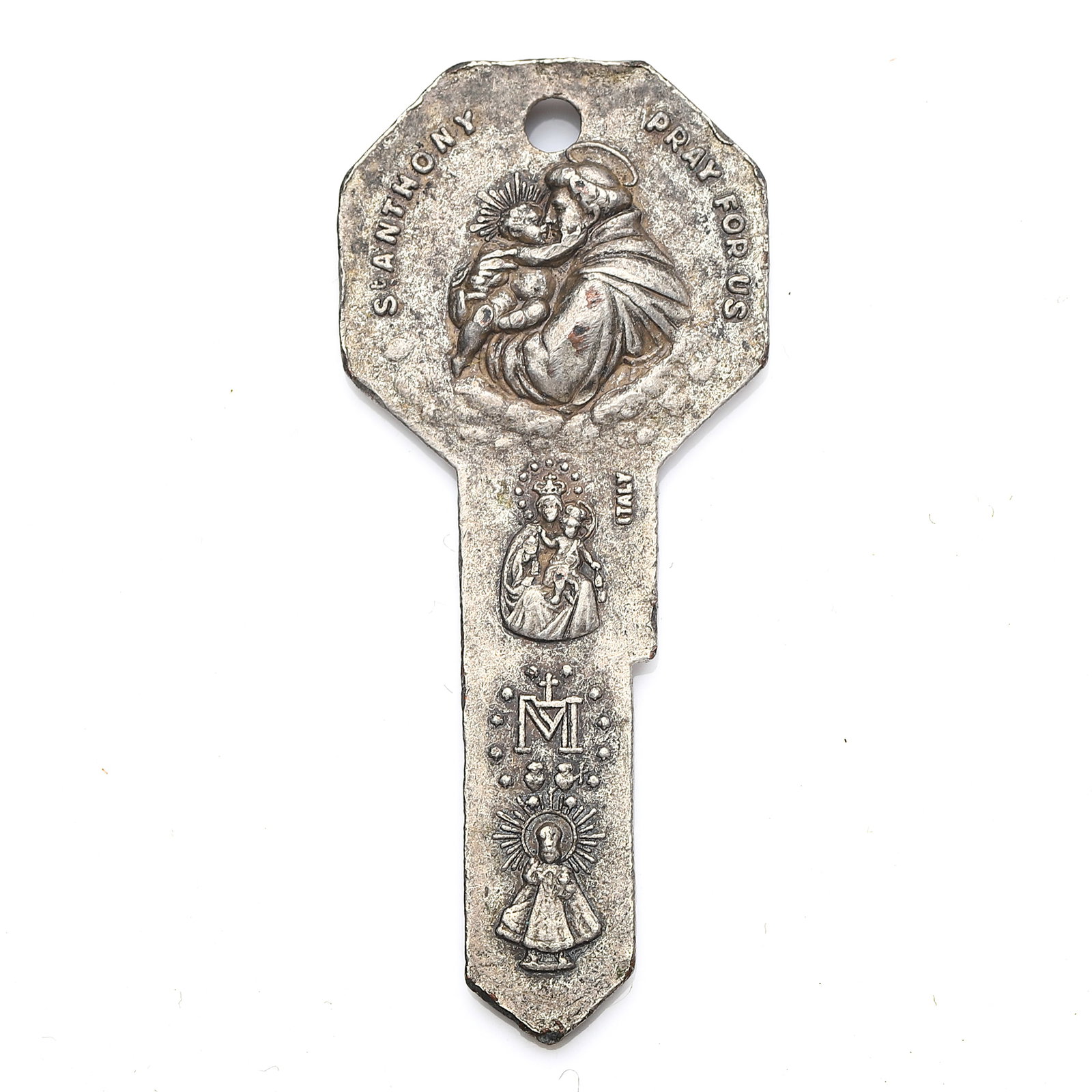 ITALIAN RELIGIOUS DEVOTIONAL KEY MEDAL FEATURING ST. ANTHONY AND ST. CHRISTOPHER: Dimensions Length: 1 9/16 in (3.98 cm); Weight: 6.5 g. Description This Italian devotional key-shaped medal features a finely cast relief of St. Anthony holding the Christ Child, surrounded by the ins