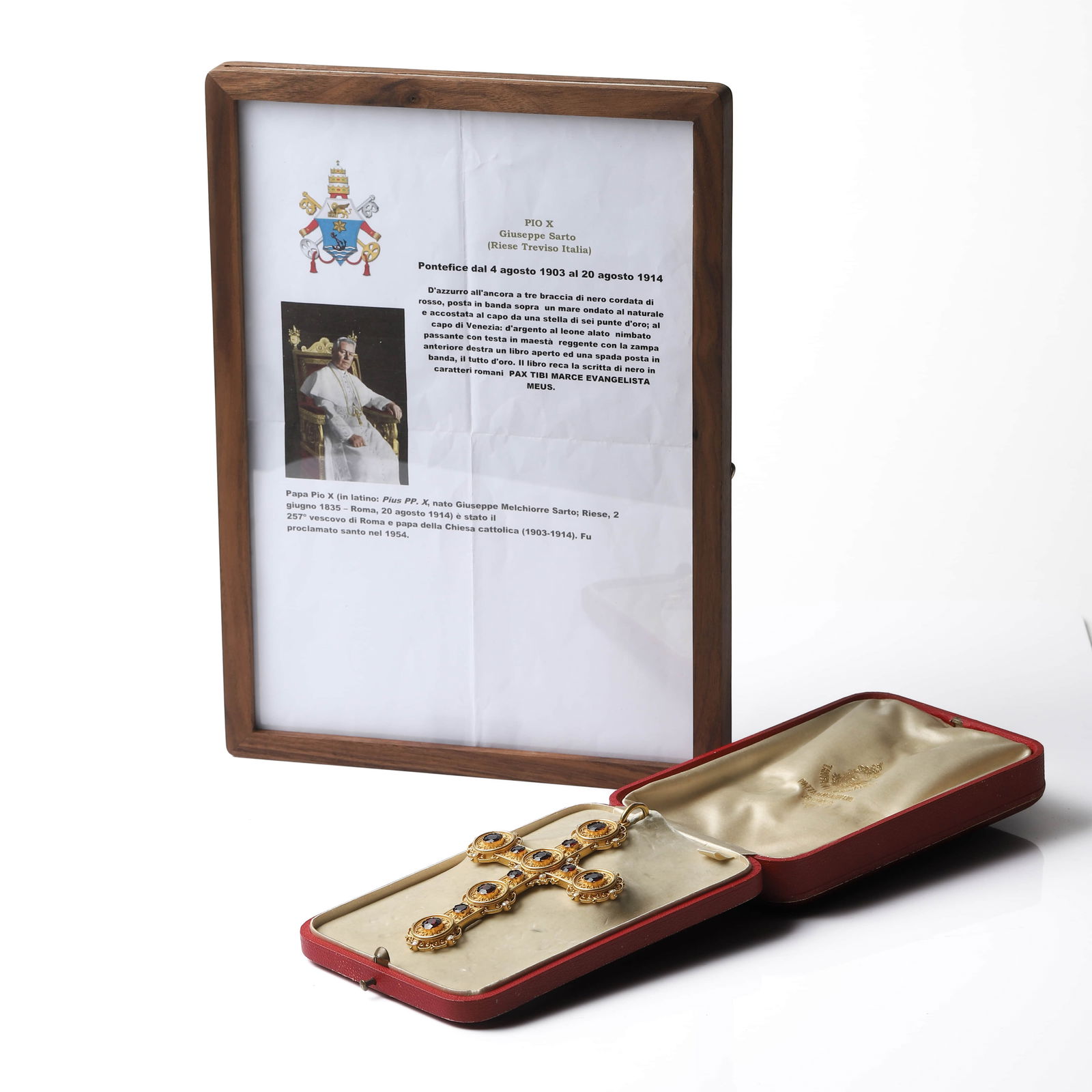 ITALIAN GOLD AND GARNET RELIQUARY CROSS PENDANT: Dimensions Length: 5 1/8 in. (13 cm); Width: 3 3/8 in. (8.5 cm); Weight: 50 g Description An impressive Italian reliquary cross pendant, finely crafted in gold and richly ornamented with deep red garn