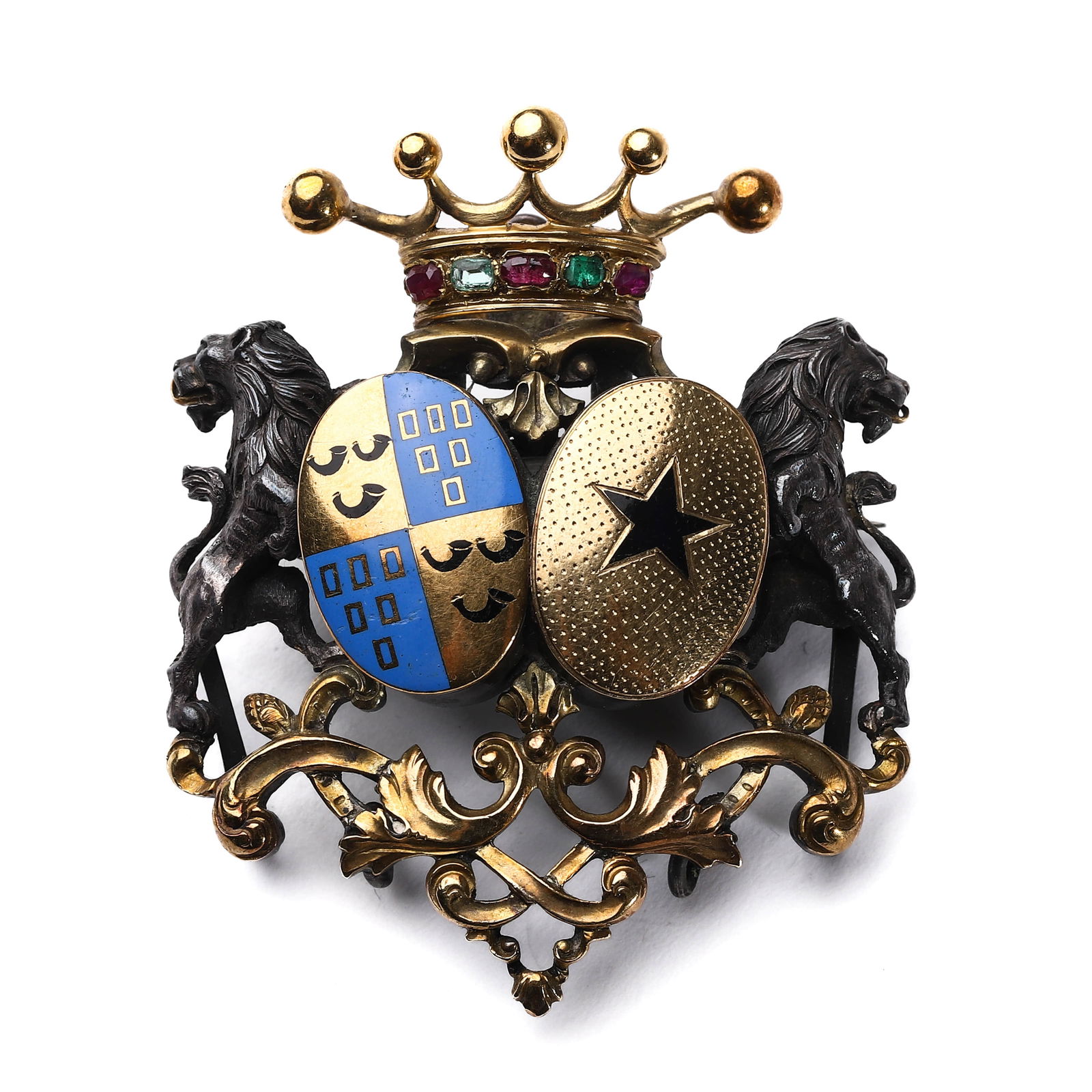A CONTINENTAL ENAMEL AND GEM-SET HERALDIC BROOCH, CIRCA LATE 19TH CENTURY.: This elaborate continental brooch features a finely modeled heraldic composition in silver and gold, set with colorful enamel and gemstones. The design presents two coats of arms, one decorated in vib