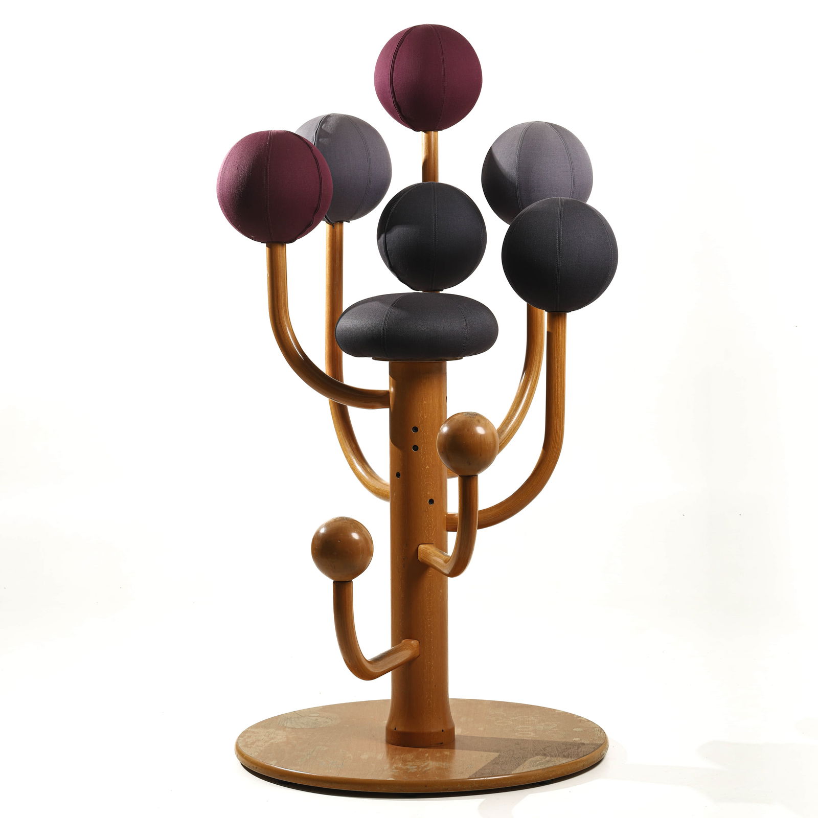 POSTMODERN SCULPTURAL COAT STAND WITH MULTICOLORED SPHERE ACCENTS: Dimensions Height: 70 7/8 in (180 cm) Description A striking postmodern sculptural coat stand featuring a natural wood cylindrical base supporting multiple curved arms, each terminating in padded sphe