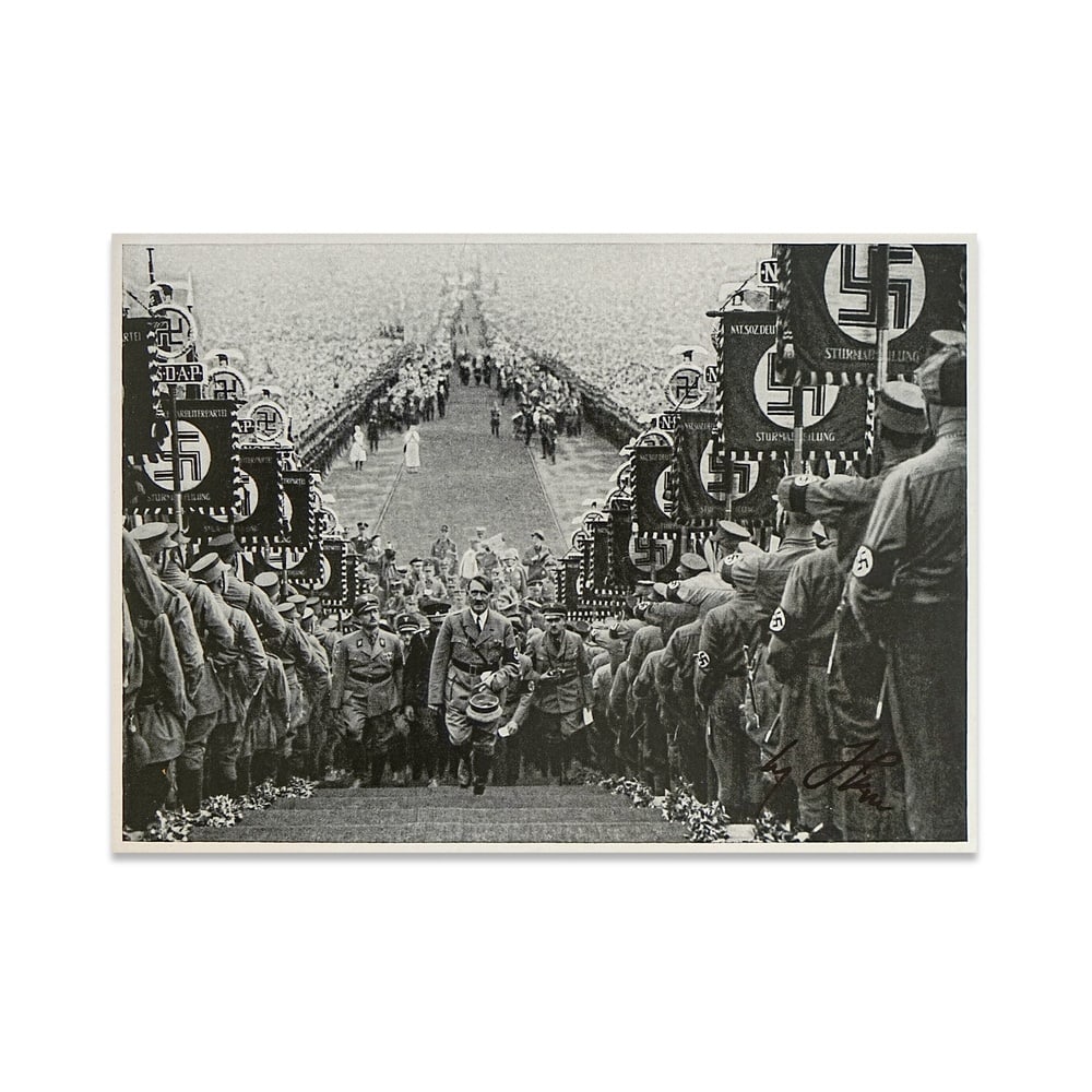 ADOLF HITLER SIGNED PROPAGANDA COLLECTOR CARD("NüRNBERG 1934" RALLY SCENE, SAMMELWERK NR.15): 6 5/8 x 4 5/8 in (16.8 x 11.8 cm) Provenance and Authentication: This collectible has undergone a rigorous forensic evaluation. The signatures were carefully analyzed across multiple criteria, includi
