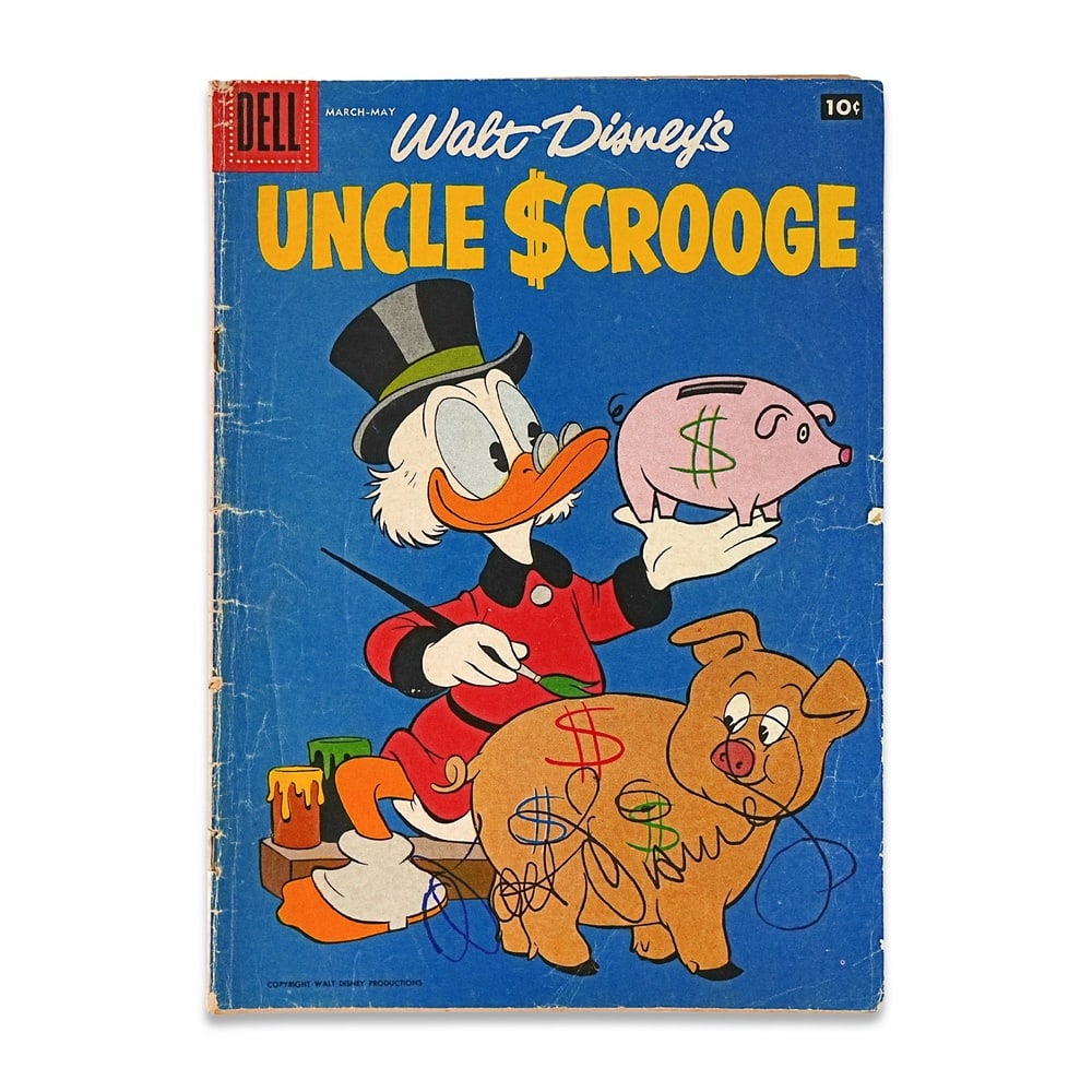 WALT DISNEY SIGNED "UNCLE SCROOGE" DELL COMIC (MID-CENTURY ISSUE): 10 1/4 x 7 1/4 in (26 x 18.5 cm) A signed copy of Walt Disney's Uncle Scrooge represents a highly desirable and visually compelling example of Disney memorabilia, combining one of the most beloved Dis