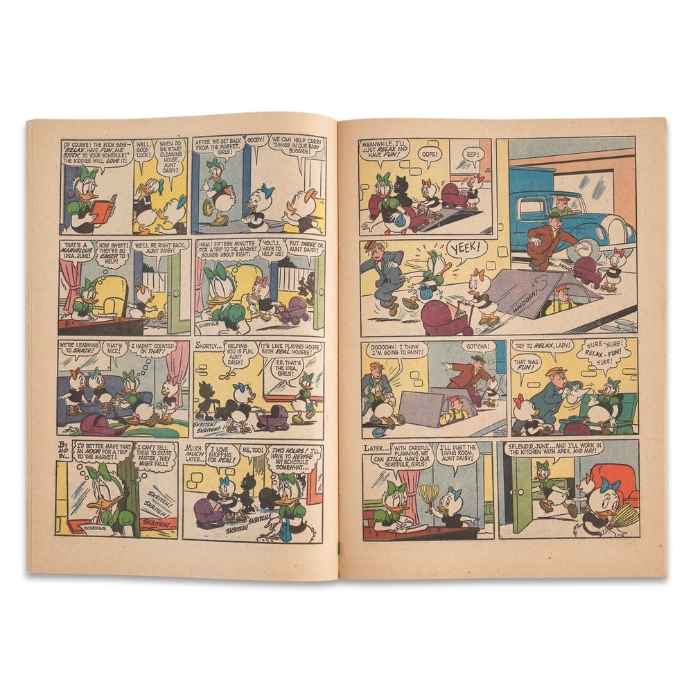 WALT DISNEY SIGNED "DONALD DUCK ALBUM" NO. 1140 - 3