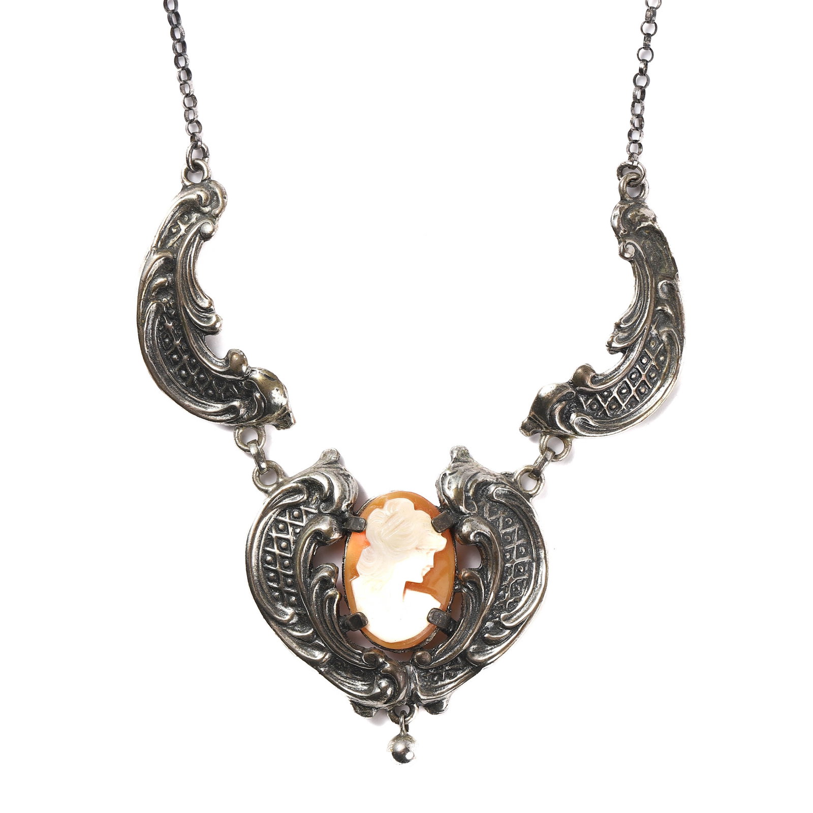 CAMEO NECKLACE WITH INTRICATE SILVER FILIGREE DESIGN.: pendant: 1 9/16 × 1 9/16 in (4 × 4 cm)