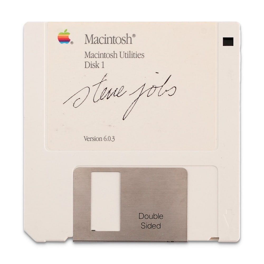 STEVE JOBS SIGNED MACINTOSH FLOPPY DISK: 3 5/8 x 3 1/2 in (9.3 x 9 cm) Provenance and Authentication: This collectible has undergone a rigorous forensic evaluation. The signatures were carefully analyzed across multiple criteria, including
