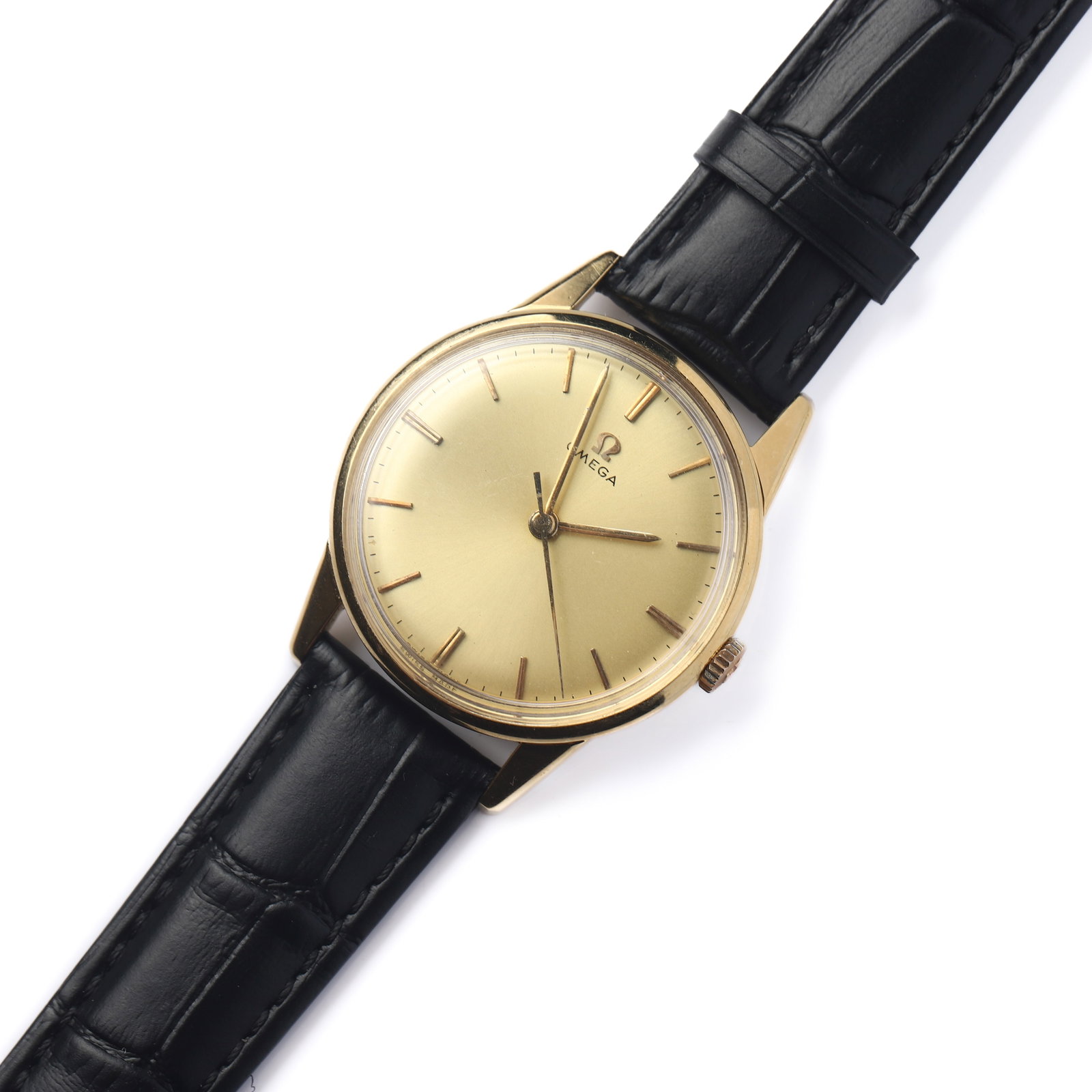 OMEGA GOLD-TONE WRISTWATCH WITH CHAMPAGNE DIAL.: Dimensions Length: 9 7/16 in (24cm); Dial diameter: 1 7/16 in (36.1mm) Description This elegant Omega wristwatch showcases a classic round gold-tone case paired with a refined champagne dial and slend