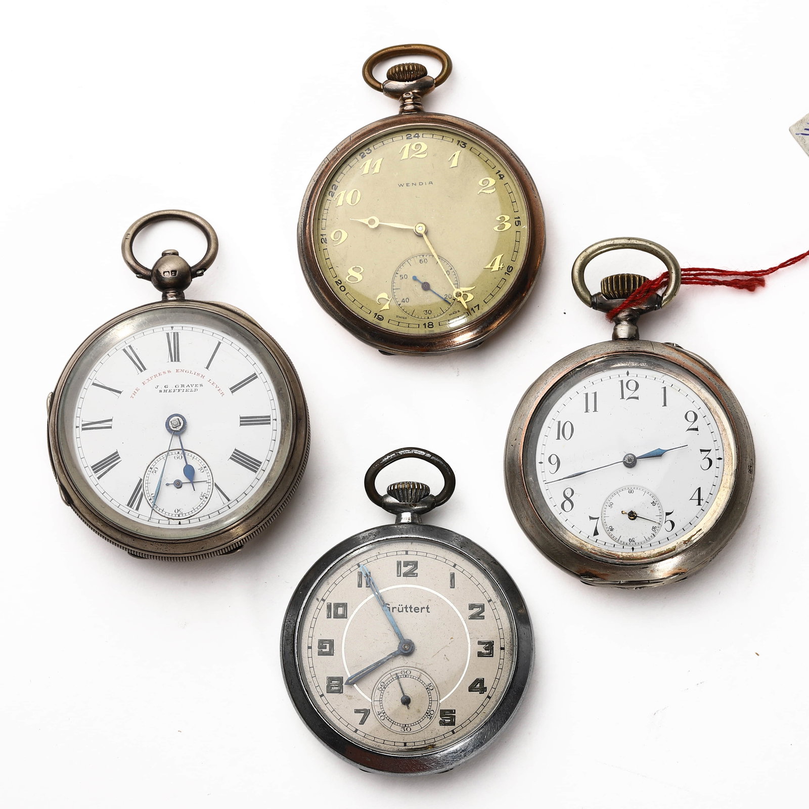 FOUR VINTAGE EUROPEAN POCKET WATCHES: Dimensions: Diameter: 2 1/16 in. (52.9 mm), Diameter: 1 15/16 in. (50.5 mm), Diameter: 2 in. (50.9 mm), Diameter: 2 in. (50.7 mm) Description: A set of four vintage mechanical pocket watches from the 