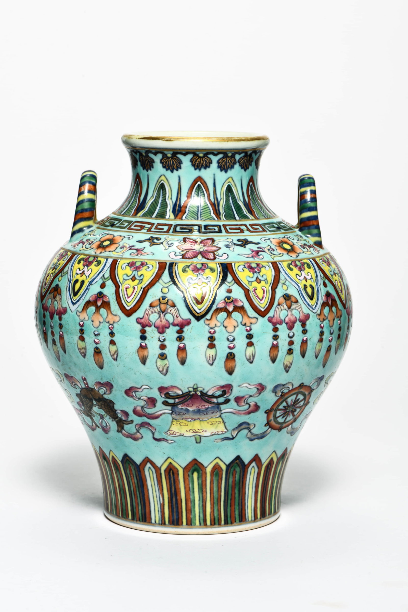 A GREEN-GROUND FAMILLE ROSE 'EIGHT BUDDHIST EMBLEMS' TWO-HANDLED VASE: A GREEN-GROUND FAMILLE ROSE 'EIGHT BUDDHIST EMBLEMS' TWO-HANDLED VASE Description: Length: 16cm Width: 16cm Height: 20cm
