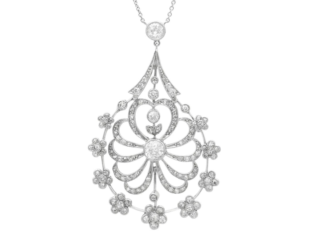 WHITE-METAL FLORAL PENDANT NECKLACE WITH COLORLESS STONES (1 of 3)