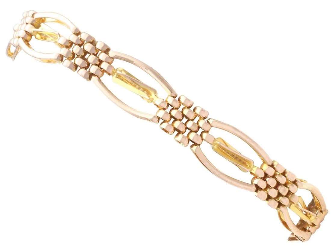 GOLD-TONE BOW BRACELET WITH COLORLESS STONE ACCENTS (1 of 2)