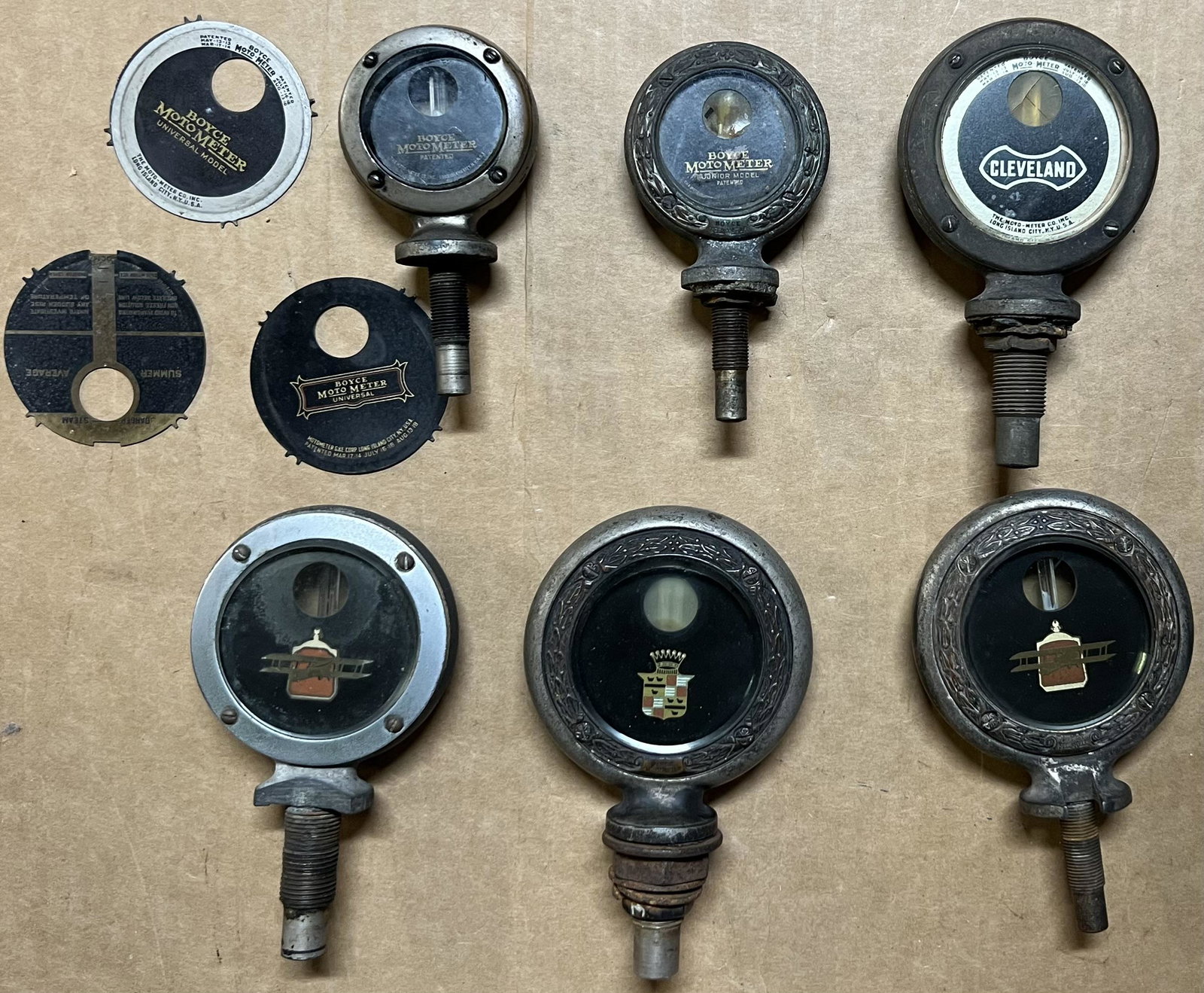 Six Boyce Motometers, window cranks, shift knobs (1 of 3)