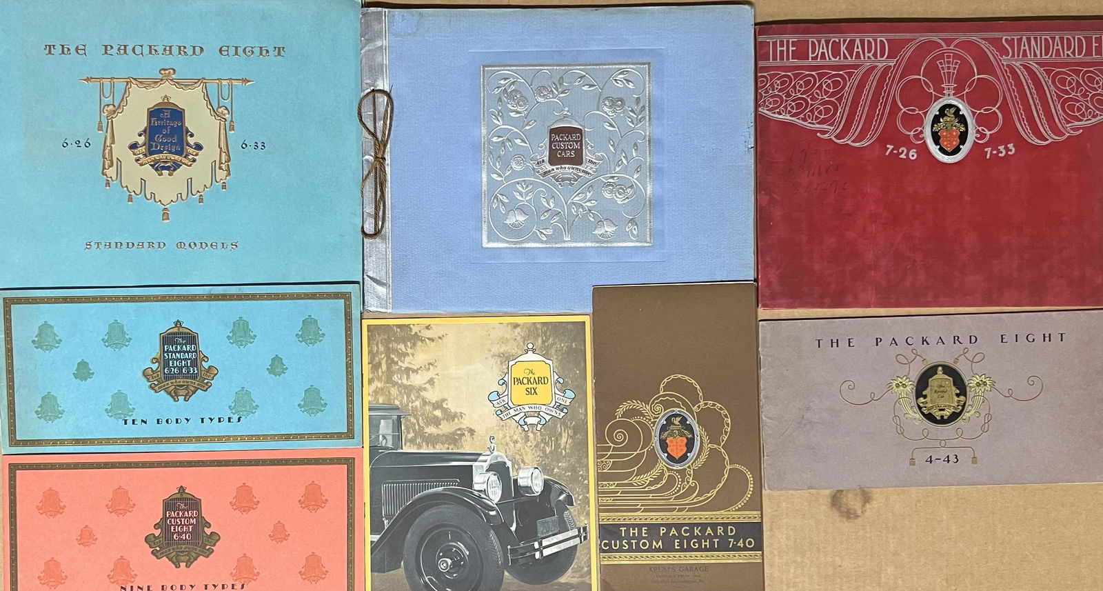 Eight Packard 1925-1930 catalogs and portfolios (1 of 3)