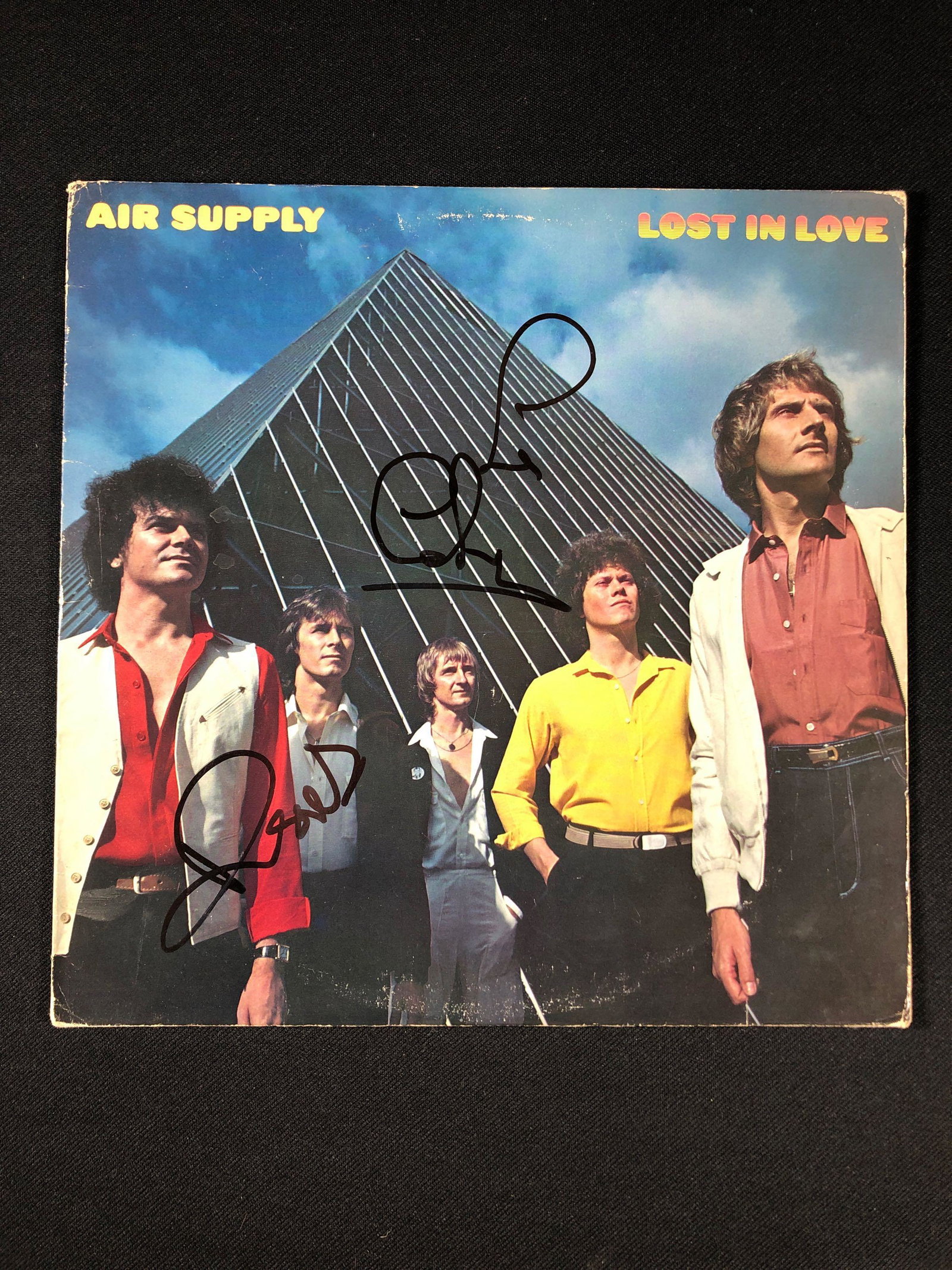 Air Supply "Lost in Love" Autographed Album: Signed by Graham Russell and Russell Hitchcock. Cover is separating.