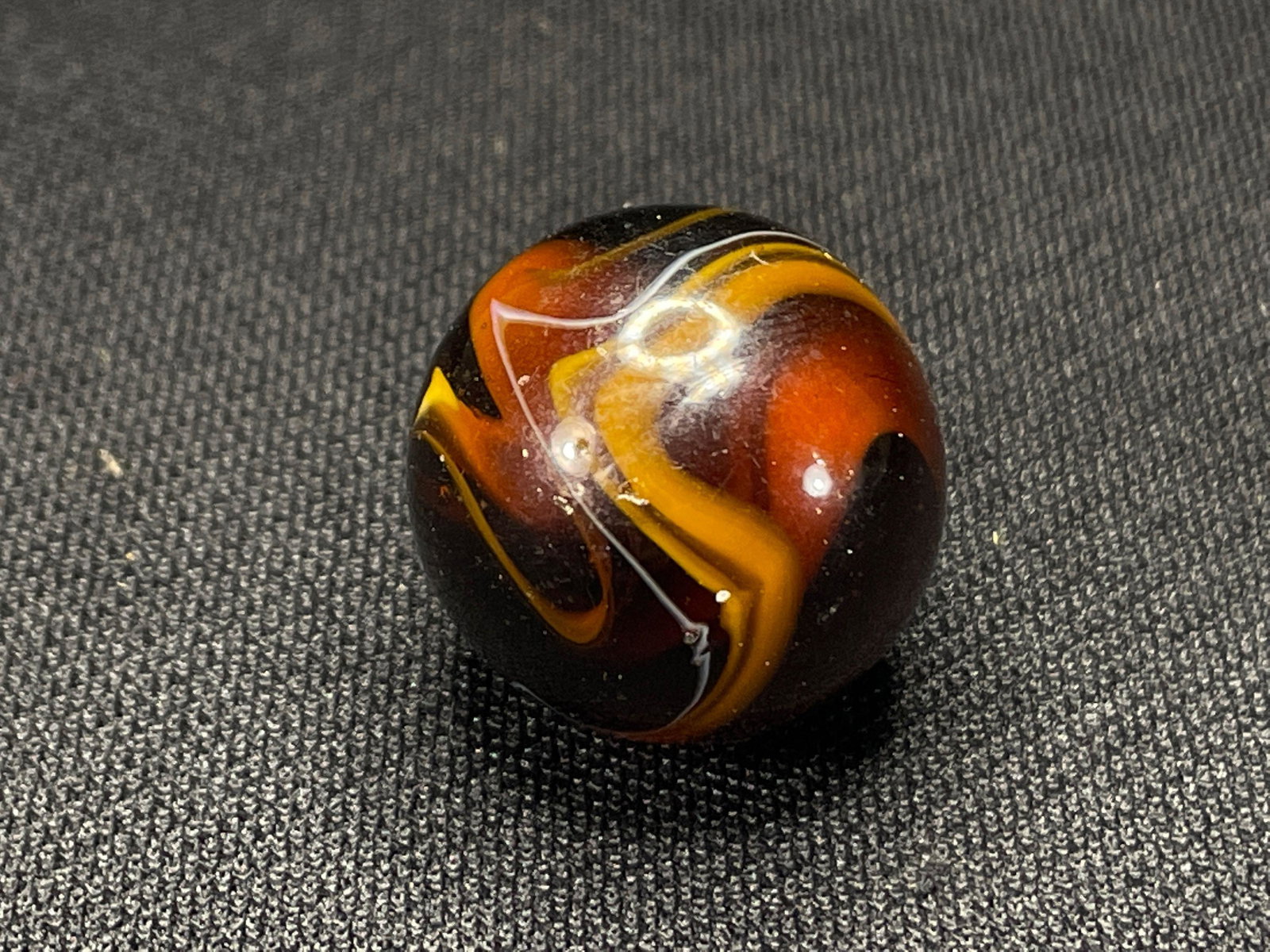 (1) Brown Slag Marble 14/16" Slight Pocket Wear: ...