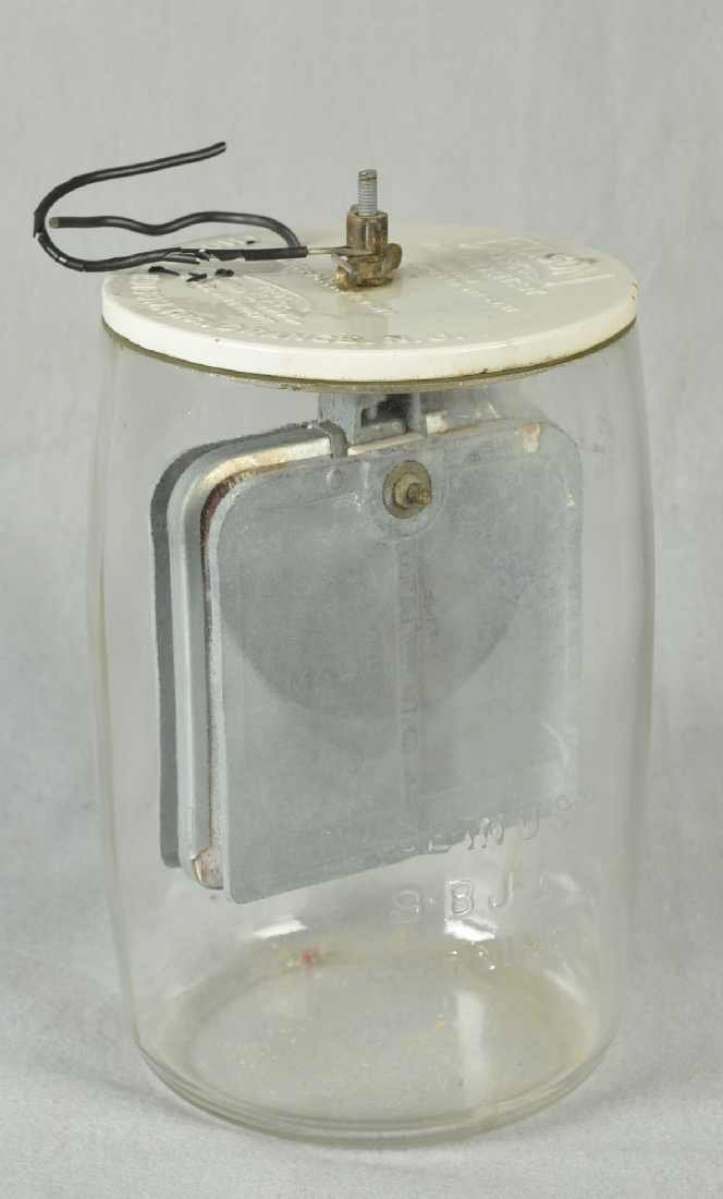EDISON BATTERY JAR, W/ CERAMIC LID & LEAD PADDLES.: EDISON BATTERY JAR, W/ CERAMIC LID & LEAD PADDLES. 10" H. LID MARKED "EDISON BSCO PRIMARY BATTERY". LAST PATENT DATE APRIL 4, 11. ALSO MARKED "THOMAS A. EDISON TRADE MARK REG. U.S. PAT. OFF."