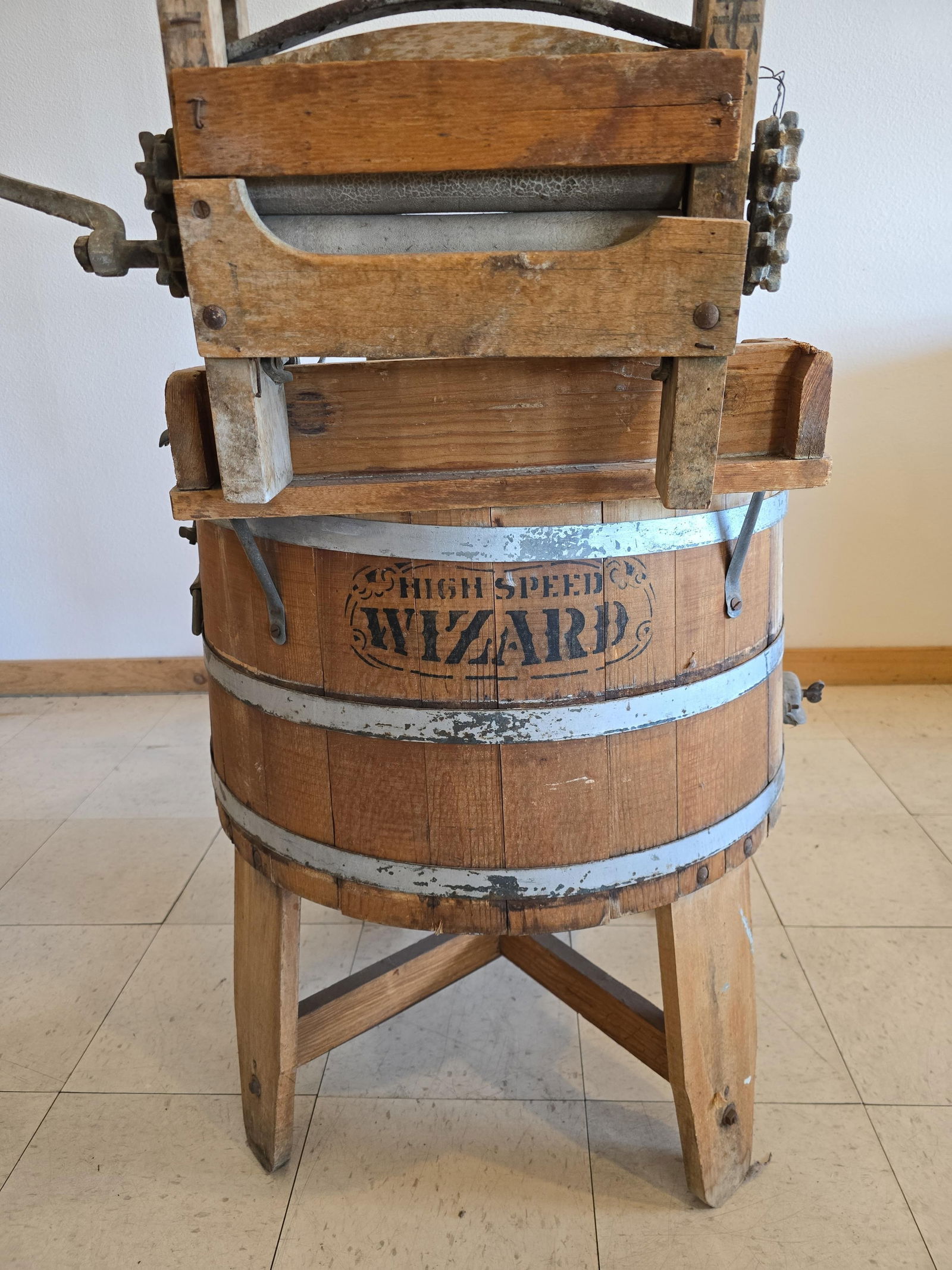 Wooden wizard washing machine and wringer: 46" high from a Keuterville family Item is located at 1105 36th St. N, Lewiston, ID Low Estimate: 100.00 High Estimate: 200.00