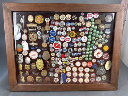 Framed collection of over 100 old badges, political buttons etc: Teddy Roosevelt buttons, Shirley Temple, Roy Rogers, Wendell Willkie, Lone Ranger, Gen. McArthur, prohibition buttons,, 1911 Pendleton roundup button. Too many to list.