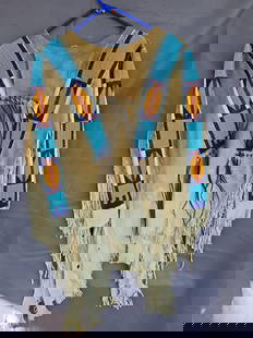 Beaded buckskin shirt, great strips on hide shirt: Mens medium size to large, Low Estimate: 400.00High Estimate: 800.00